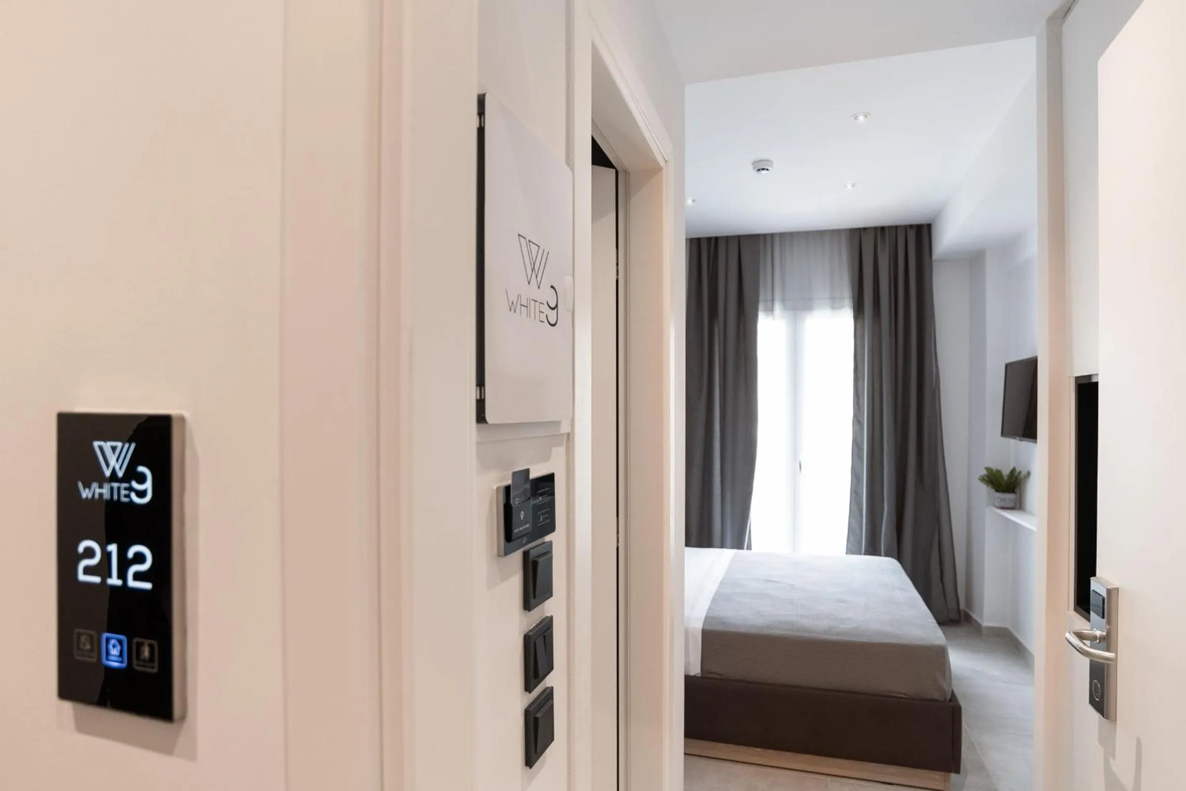 Photo of the whole room, Bed in White 9