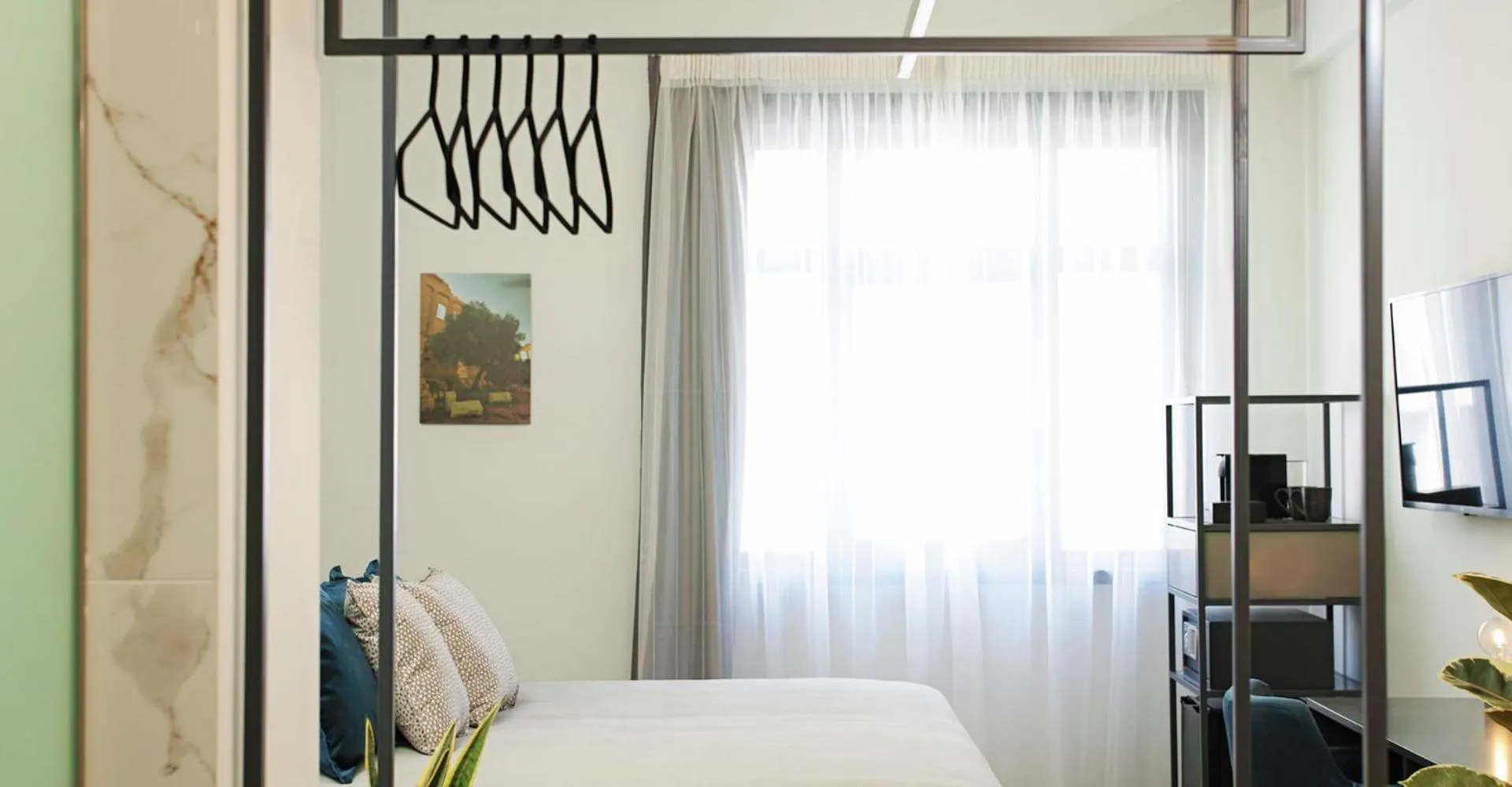 Bed in The Gem Society Hotel