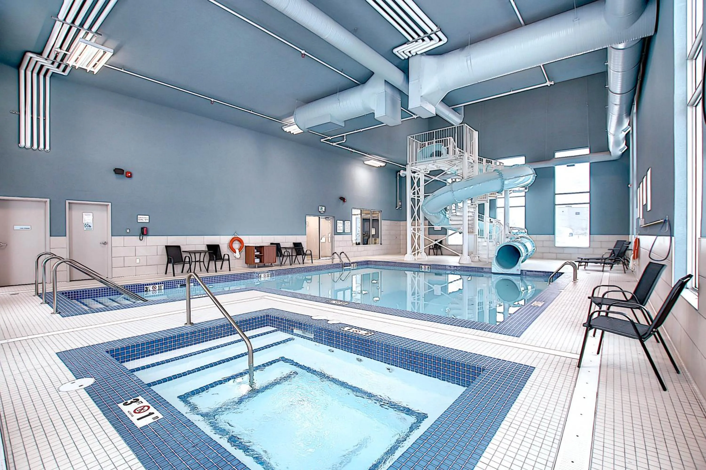 Swimming pool in Holiday Inn Express & Suites - Calgary Airport Trail NE by IHG
