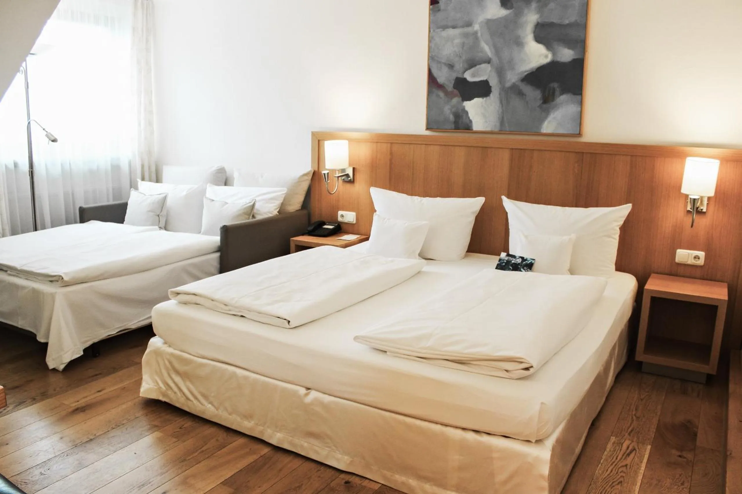 Bed in Romantik Hotel Hirschen