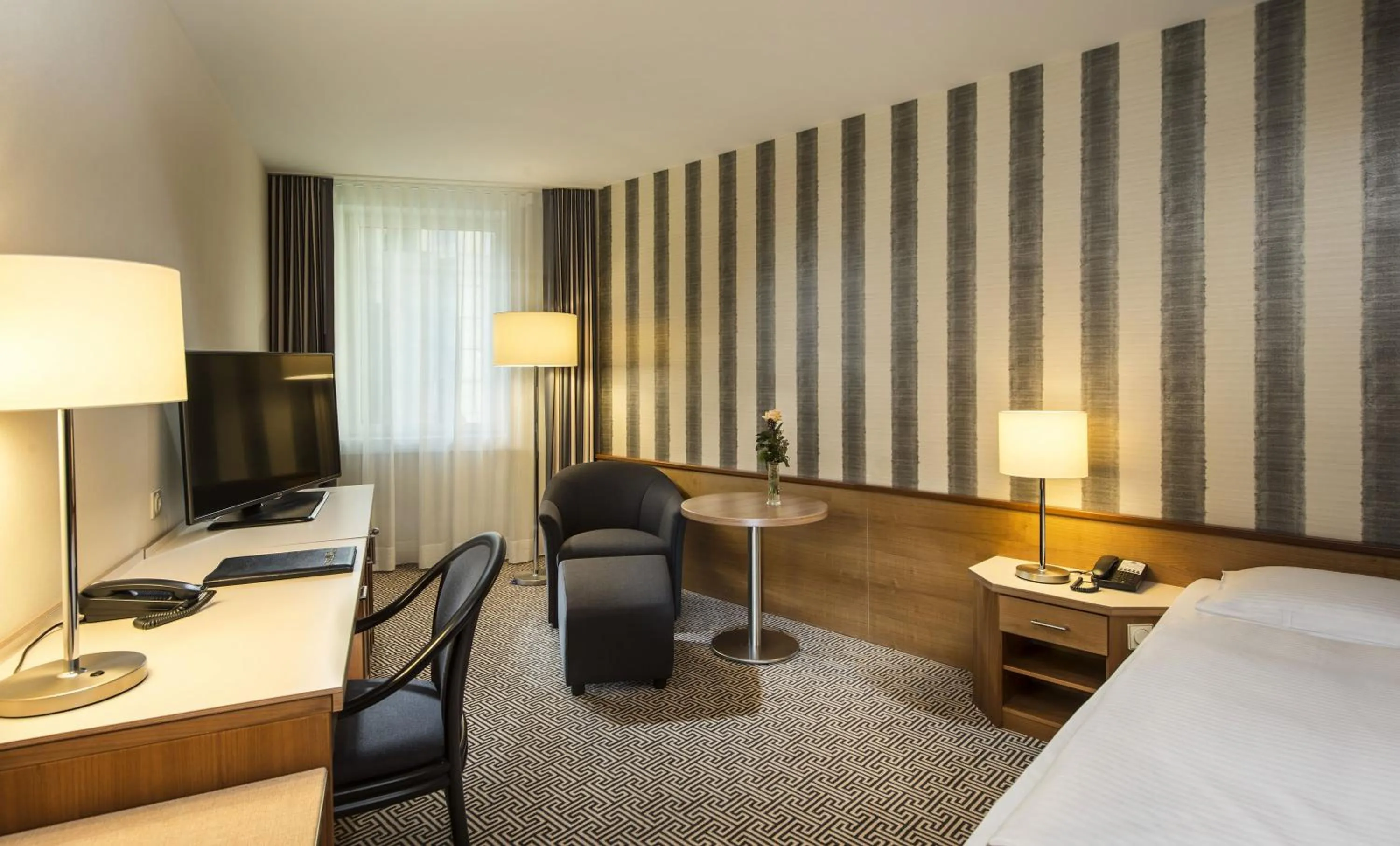 Photo of the whole room, Bed in Maritim Hotel Stuttgart