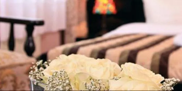 Bed in Hotel-Pension Cortina