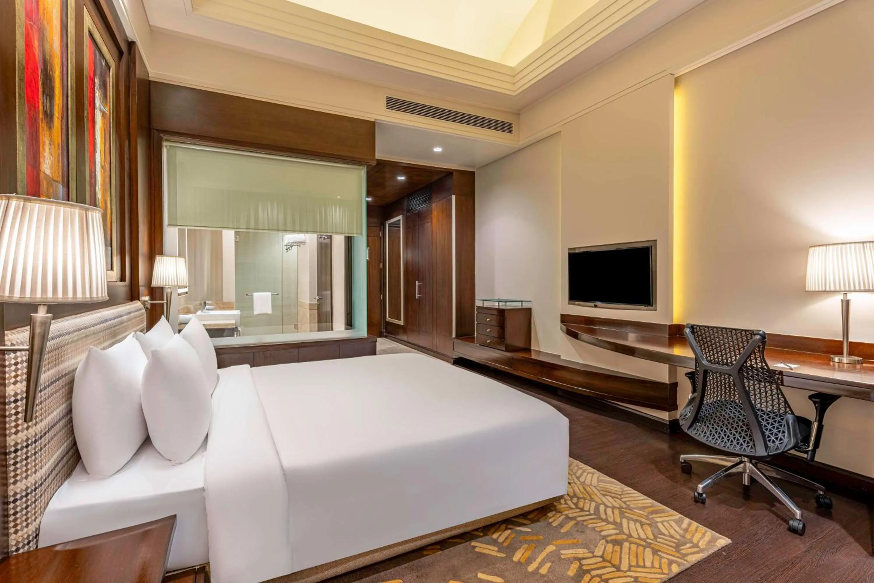 Bedroom, Bed in Radisson Noida