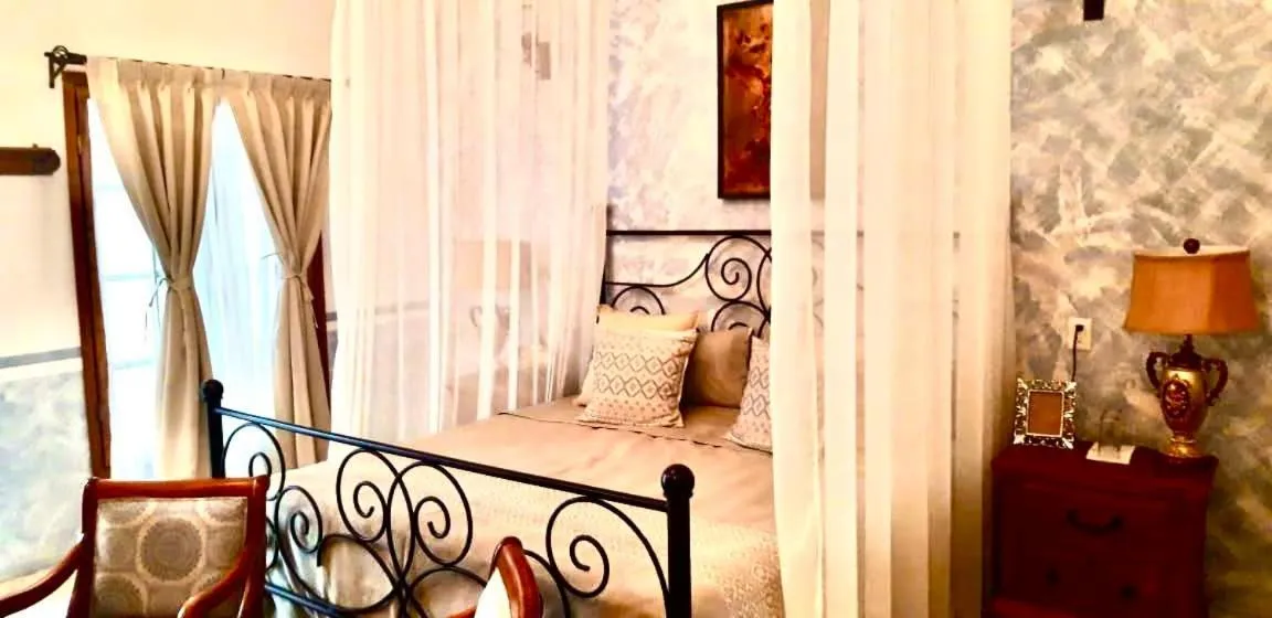 Bed in Hotel Hacienda San Isidro