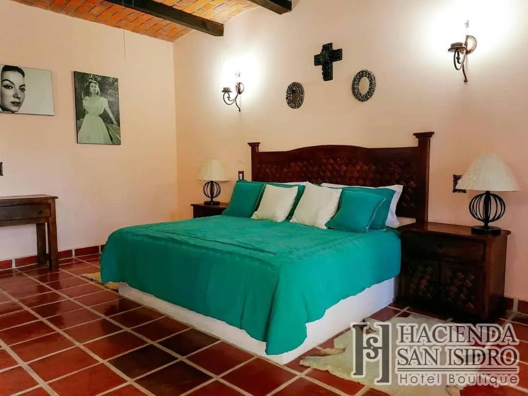 Bed in Hotel Hacienda San Isidro