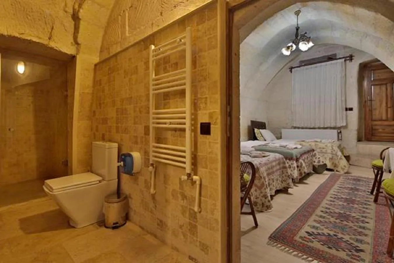 Bathroom, Bed in View Cave Hotel