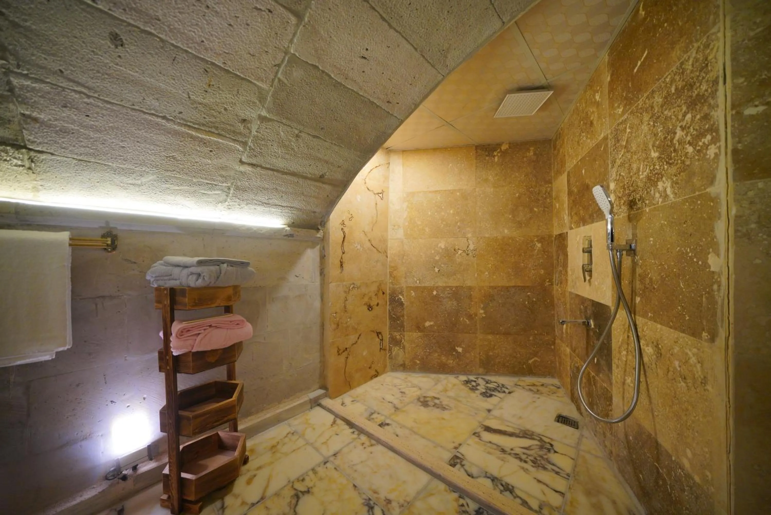 Shower, Bed in View Cave Hotel