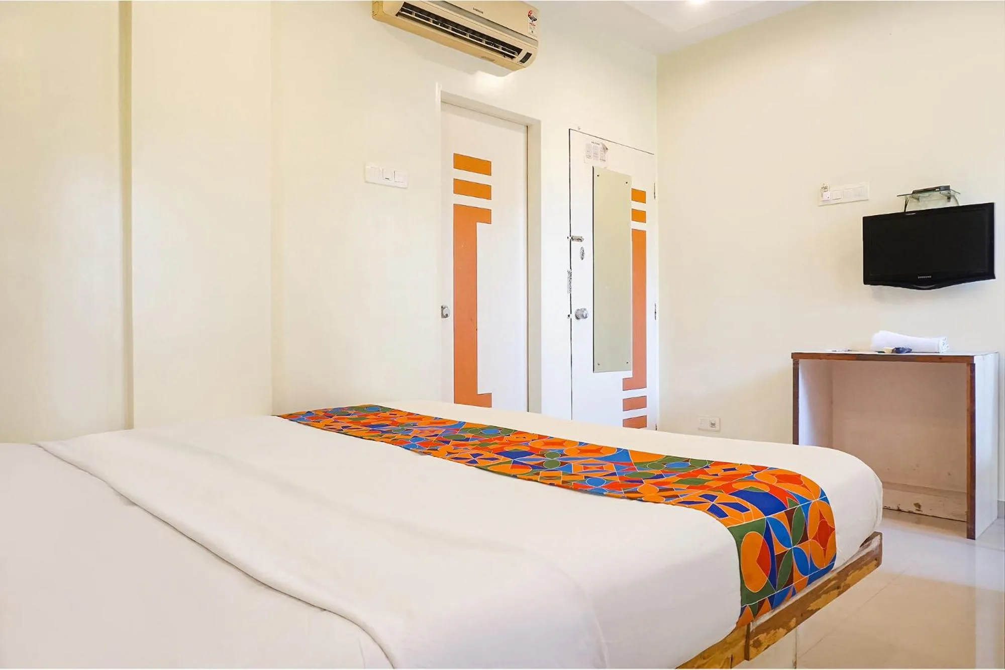 Bed in FabHotel Shree Swami, Nr Bird Valley Udyan