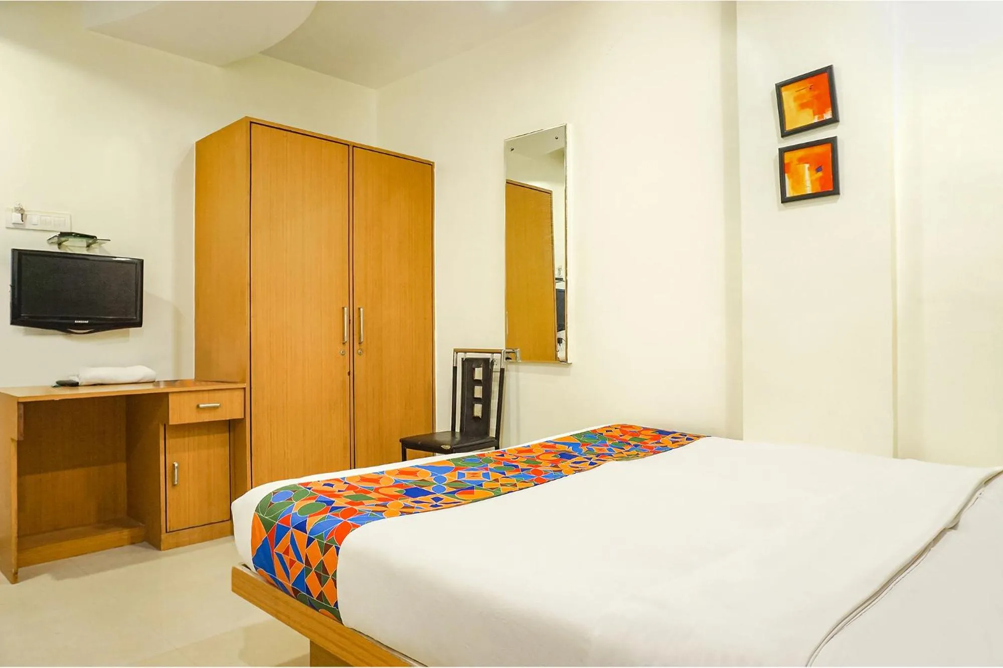 Bed in FabHotel Shree Swami, Nr Bird Valley Udyan