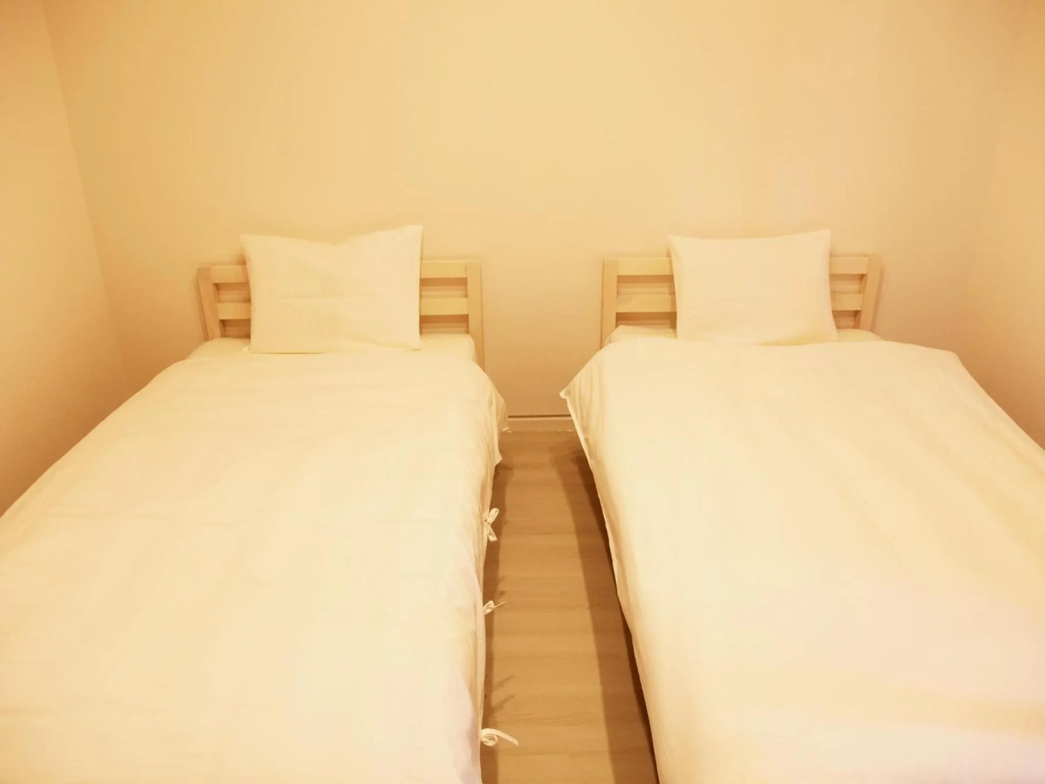 Bed in Mango Resort Okinawa Naha