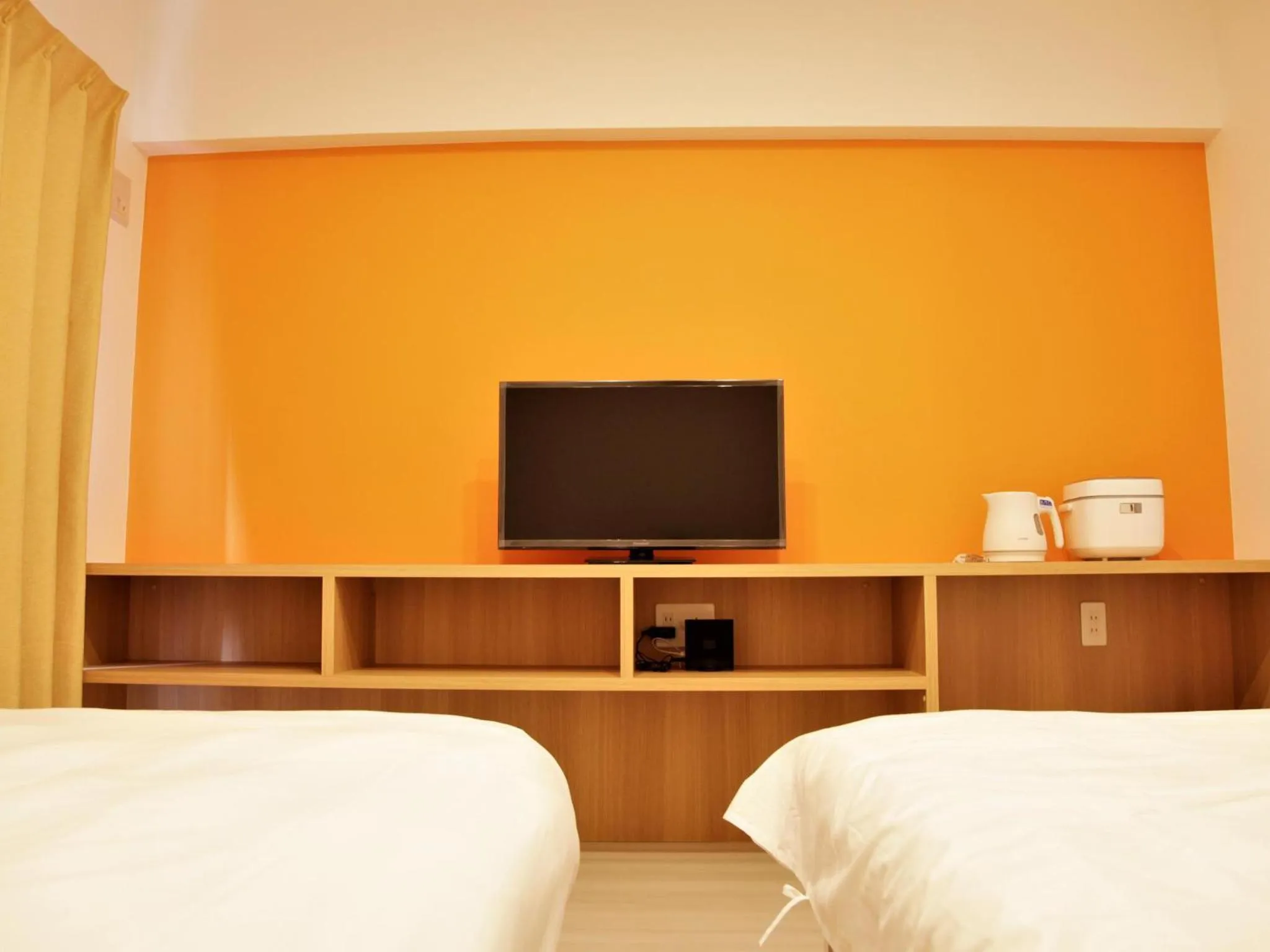 Bed in Mango Resort Okinawa Naha