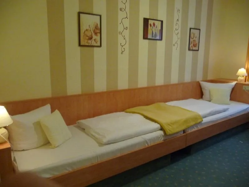 Bed in Hotel Garni am Schlosspark