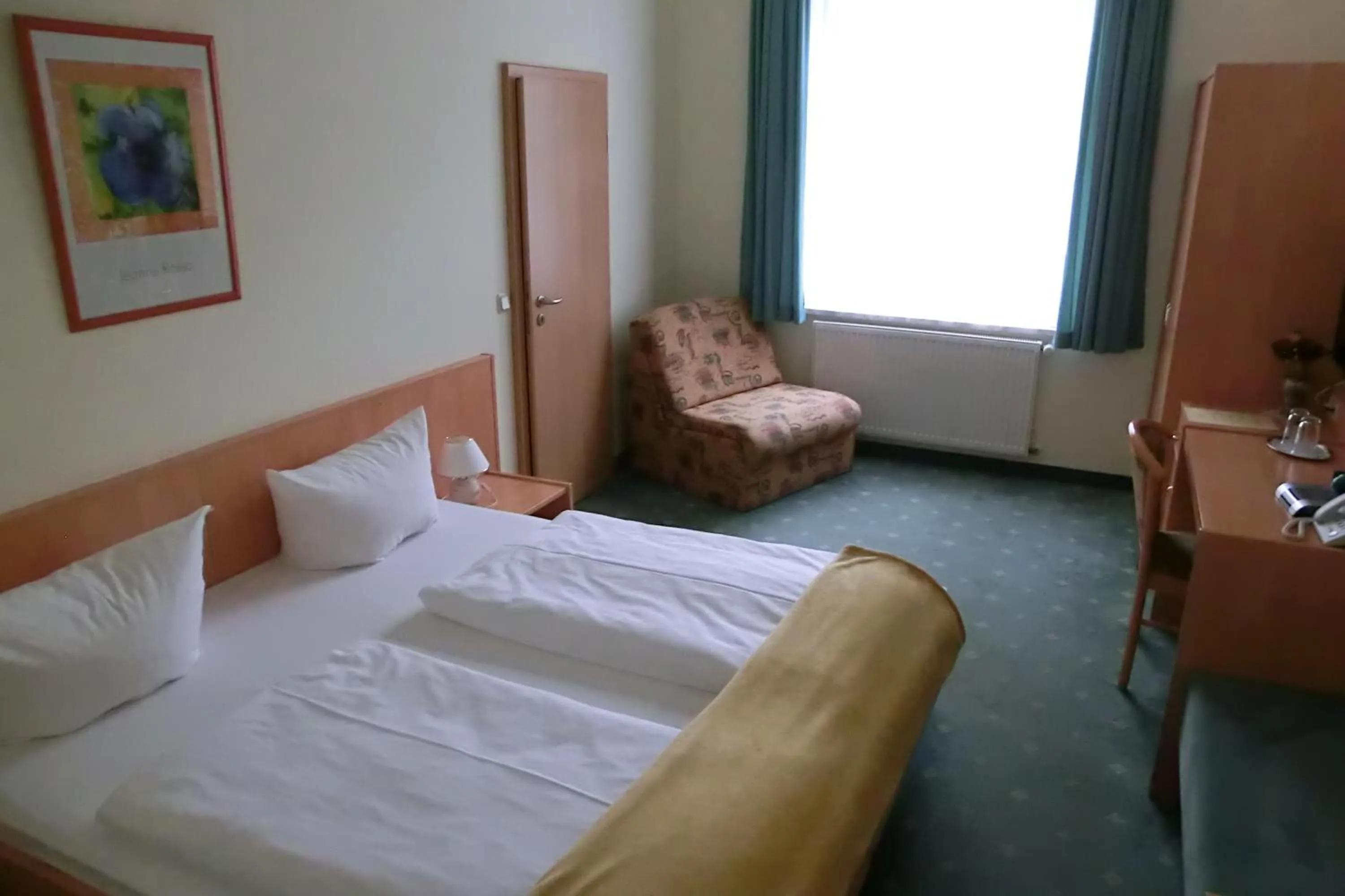 Photo of the whole room, Bed in Hotel Garni am Schlosspark