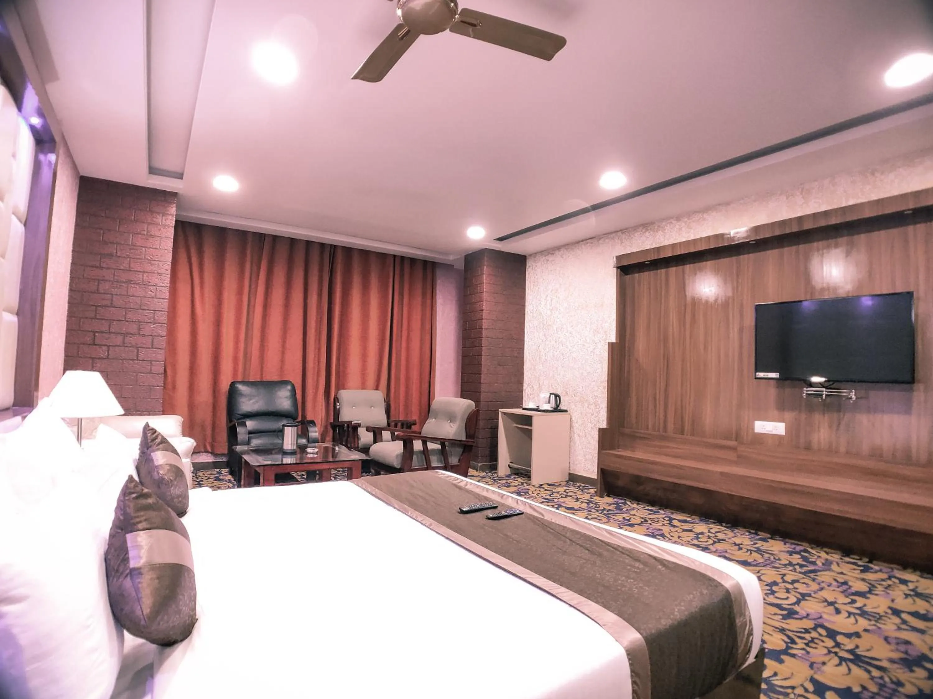 Bed in Hotel Vishnu Empire