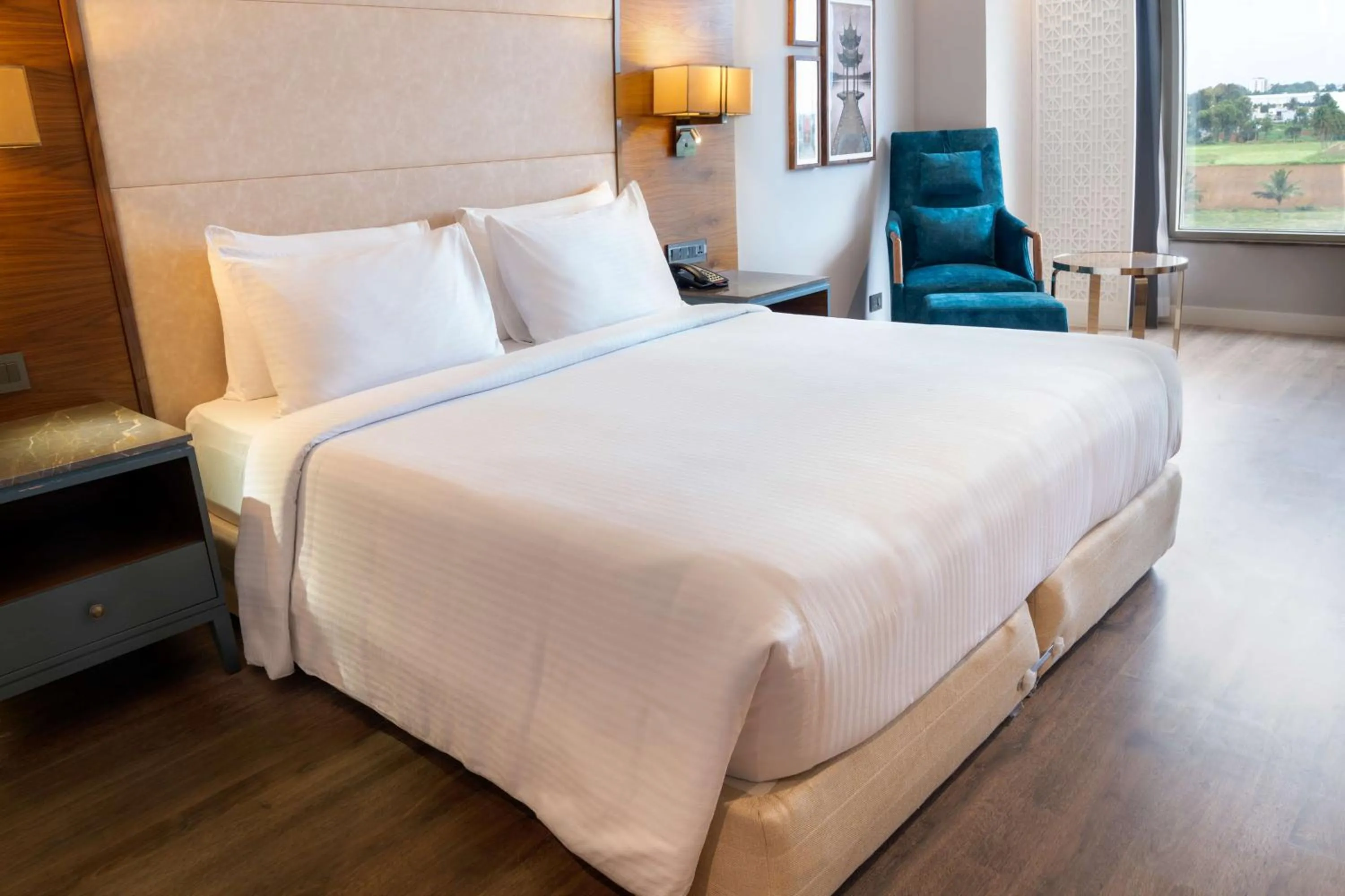 Photo of the whole room, Bed in The Elite Narasapura, a member of Radisson Individuals