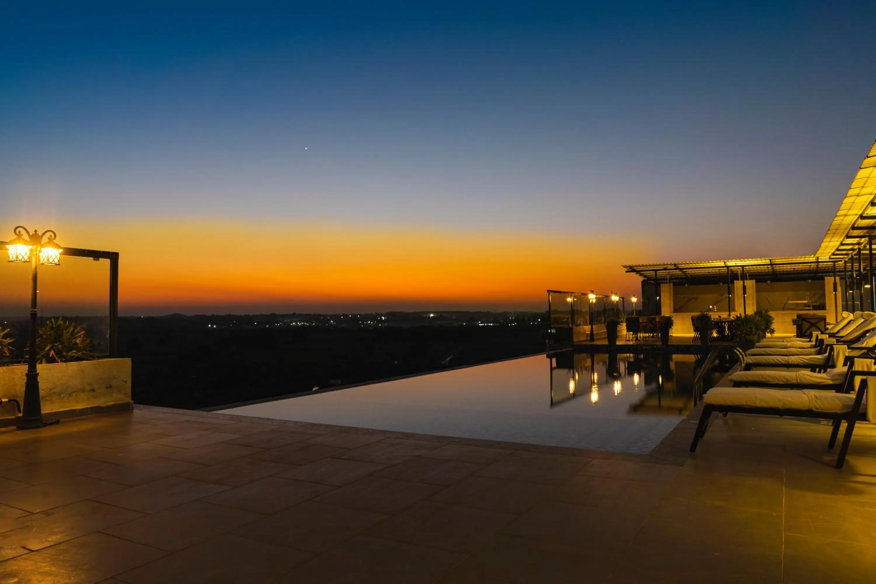 Sunset in The Elite Narasapura, a member of Radisson Individuals