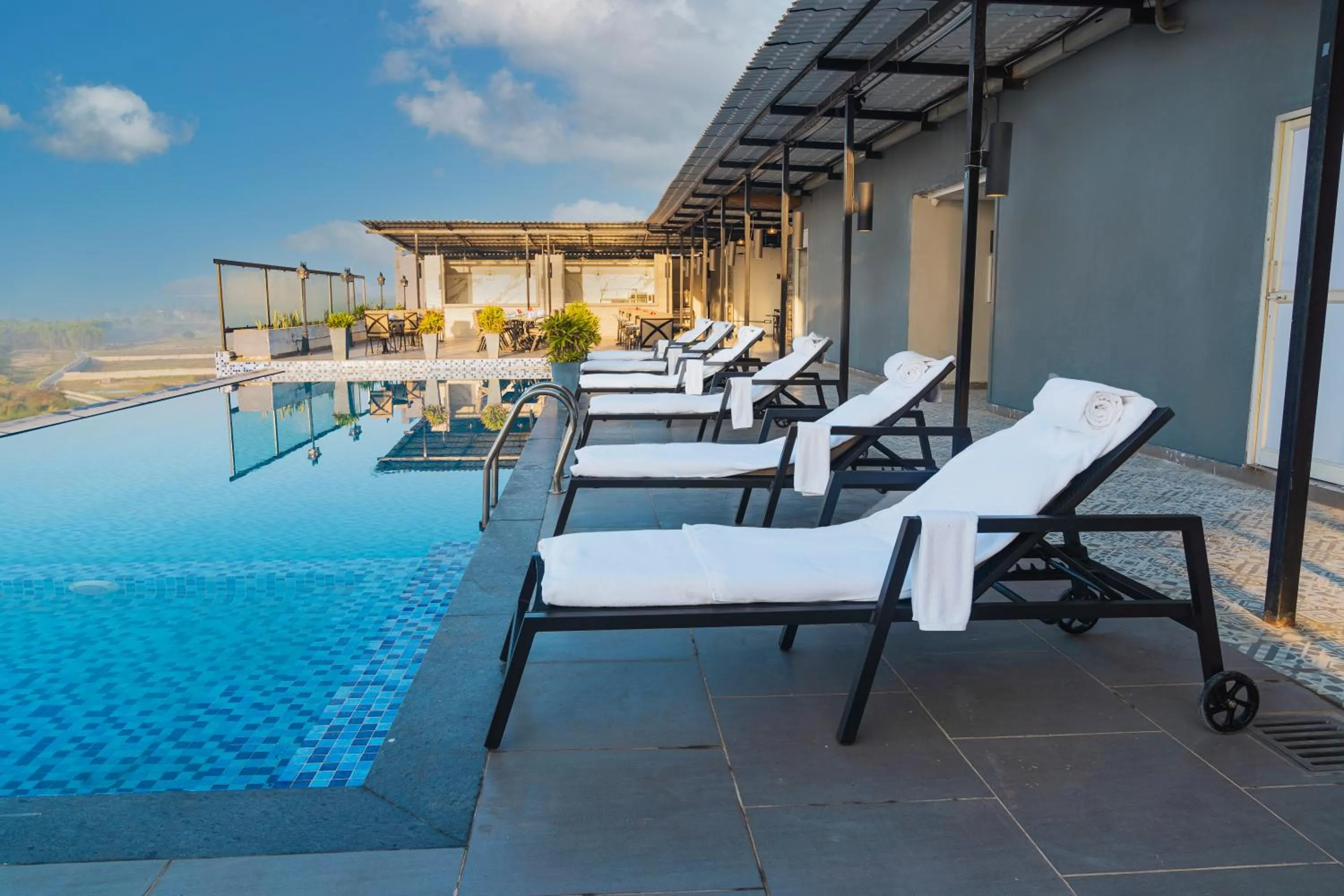 Swimming pool in The Elite Narasapura, a member of Radisson Individuals