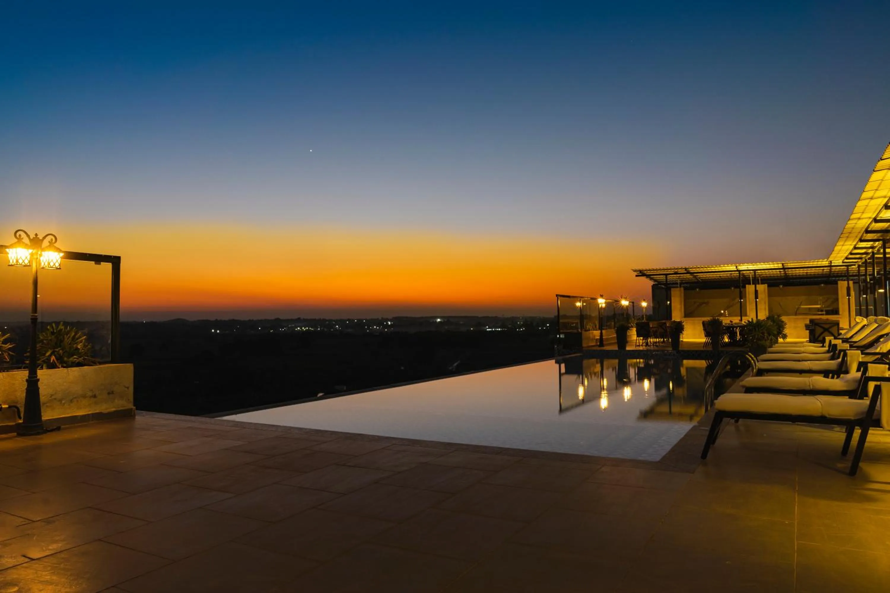 Sunset in The Elite Narasapura, a member of Radisson Individuals