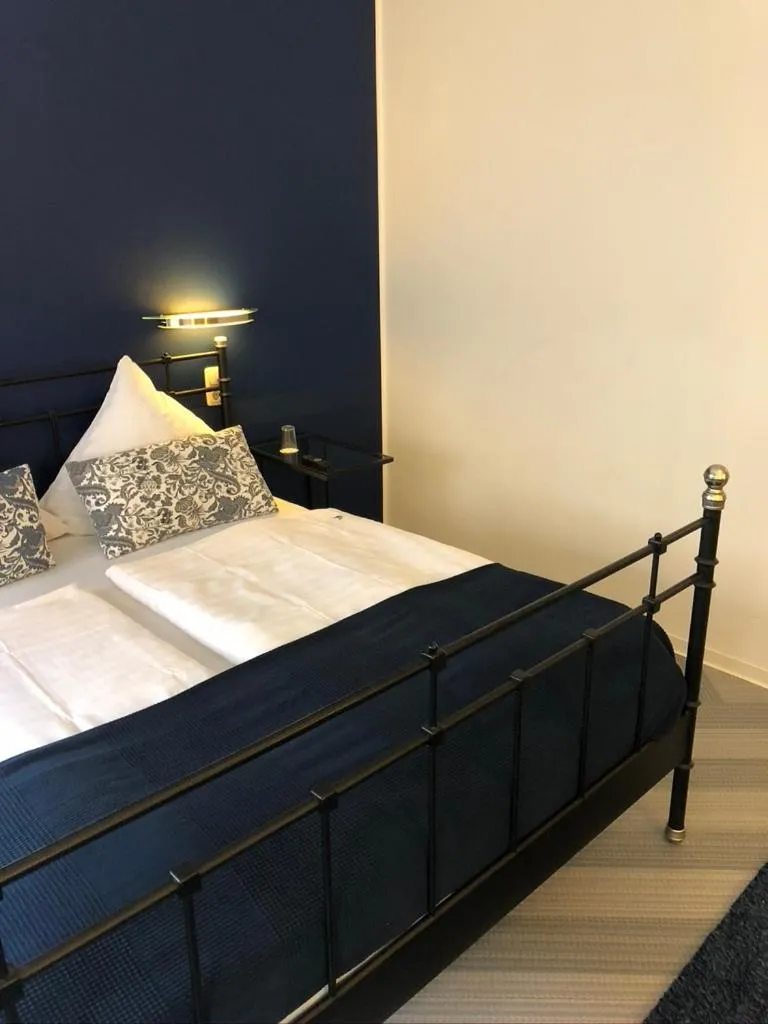 Photo of the whole room, Bed in bensons hotel