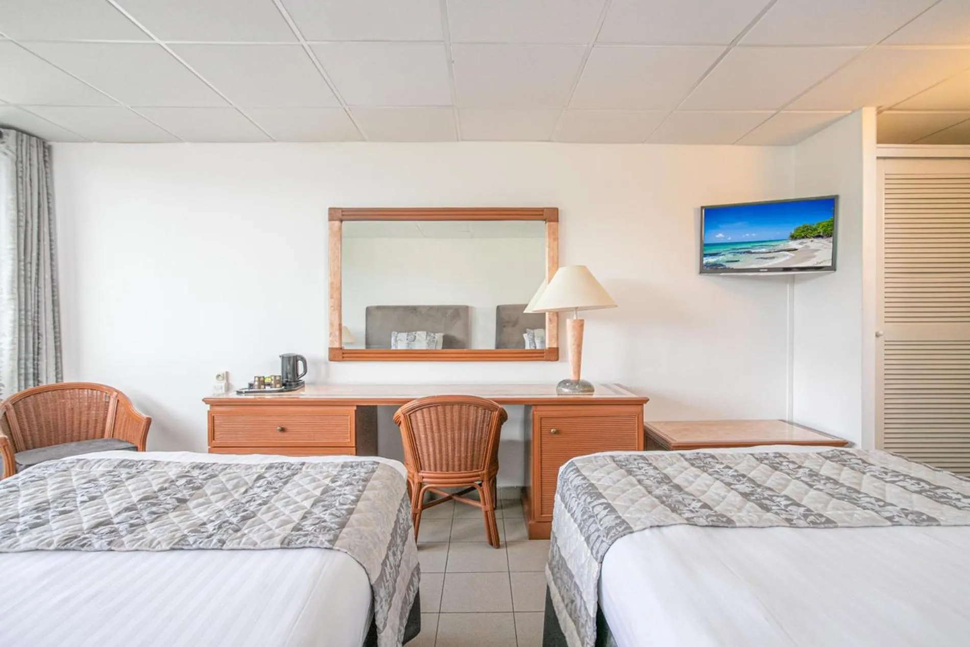 Photo of the whole room, Bed in Karibea La Valmenière Hôtel