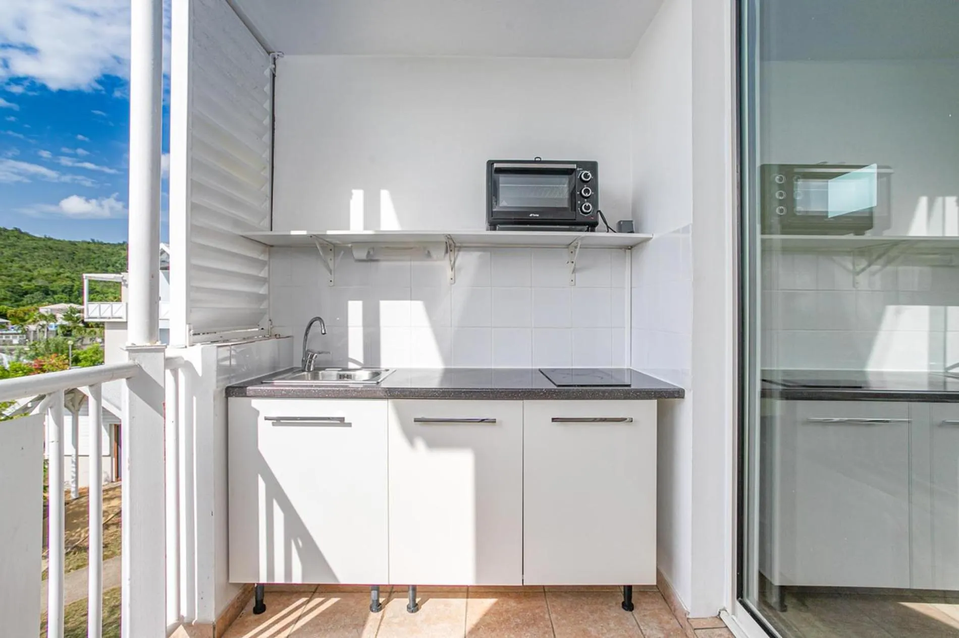 Kitchen or kitchenette in Karibea Sainte Luce Hotel