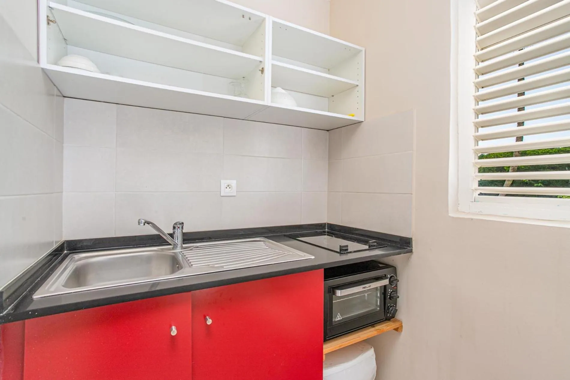 Kitchen or kitchenette in Karibea Sainte Luce Hotel