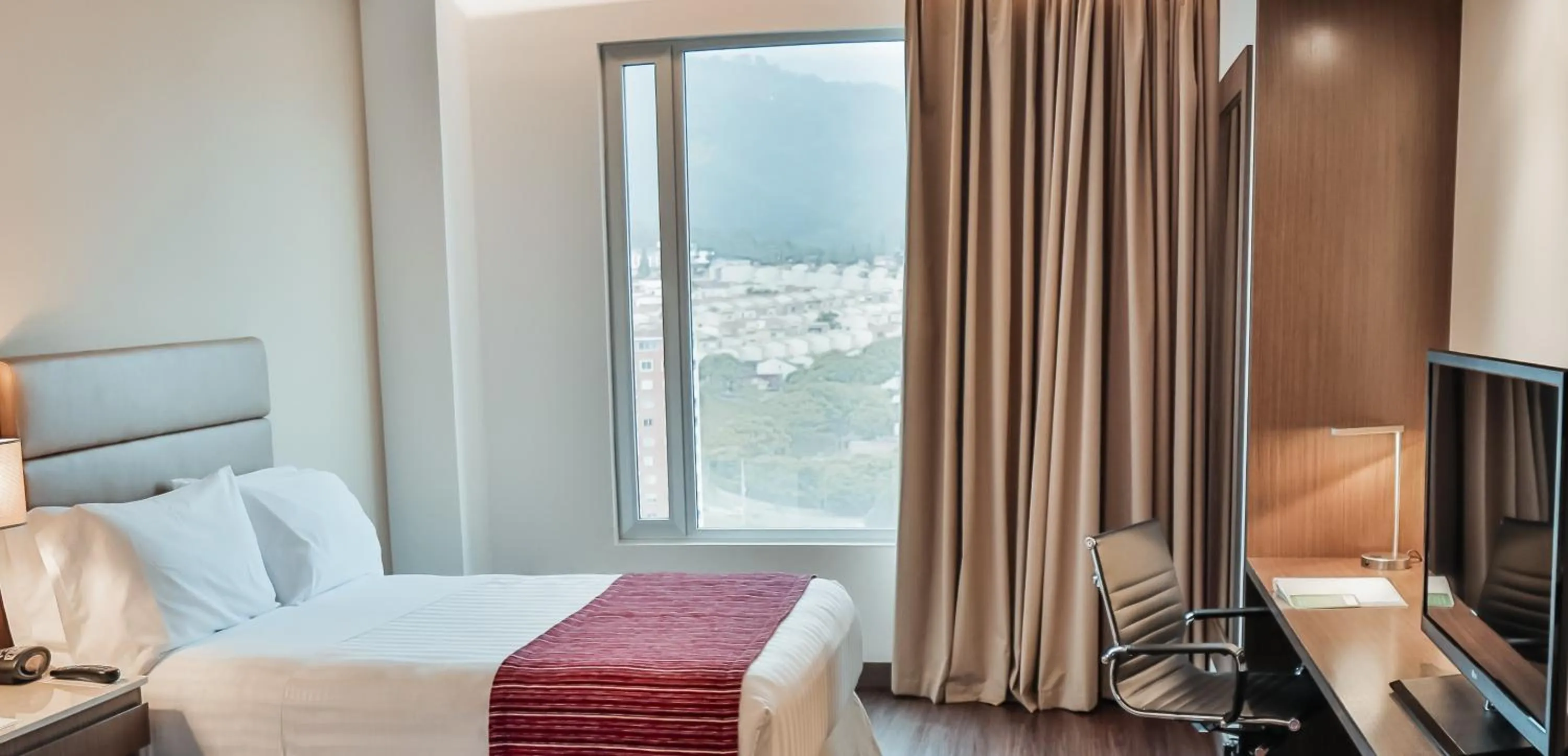 Bed in Holiday Inn Bucaramanga Cacique by IHG