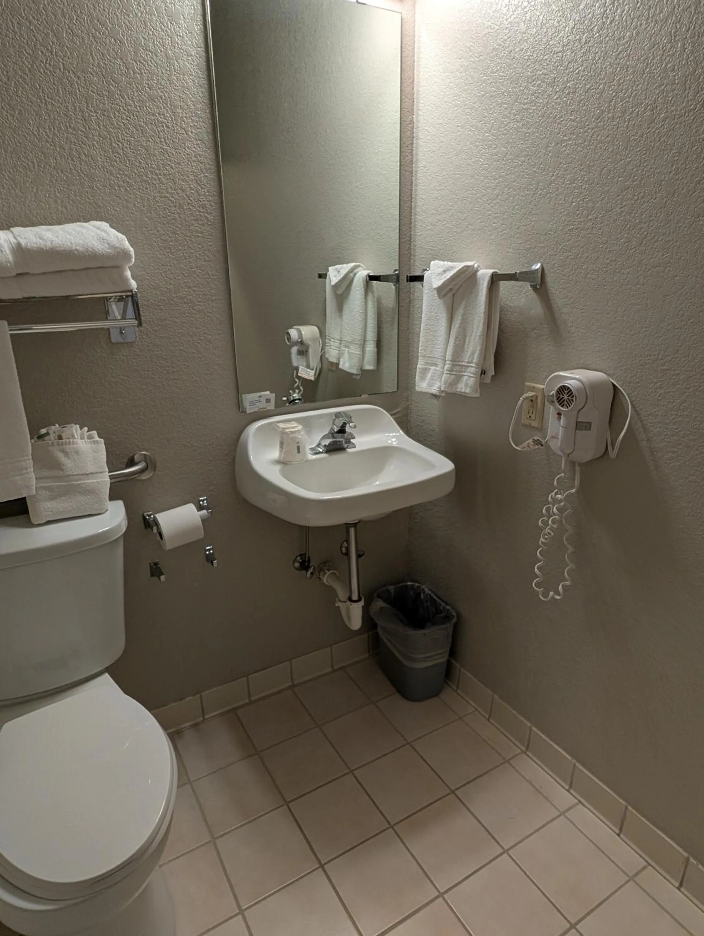 Toilet in Days Inn & Suites by Wyndham Castle Rock