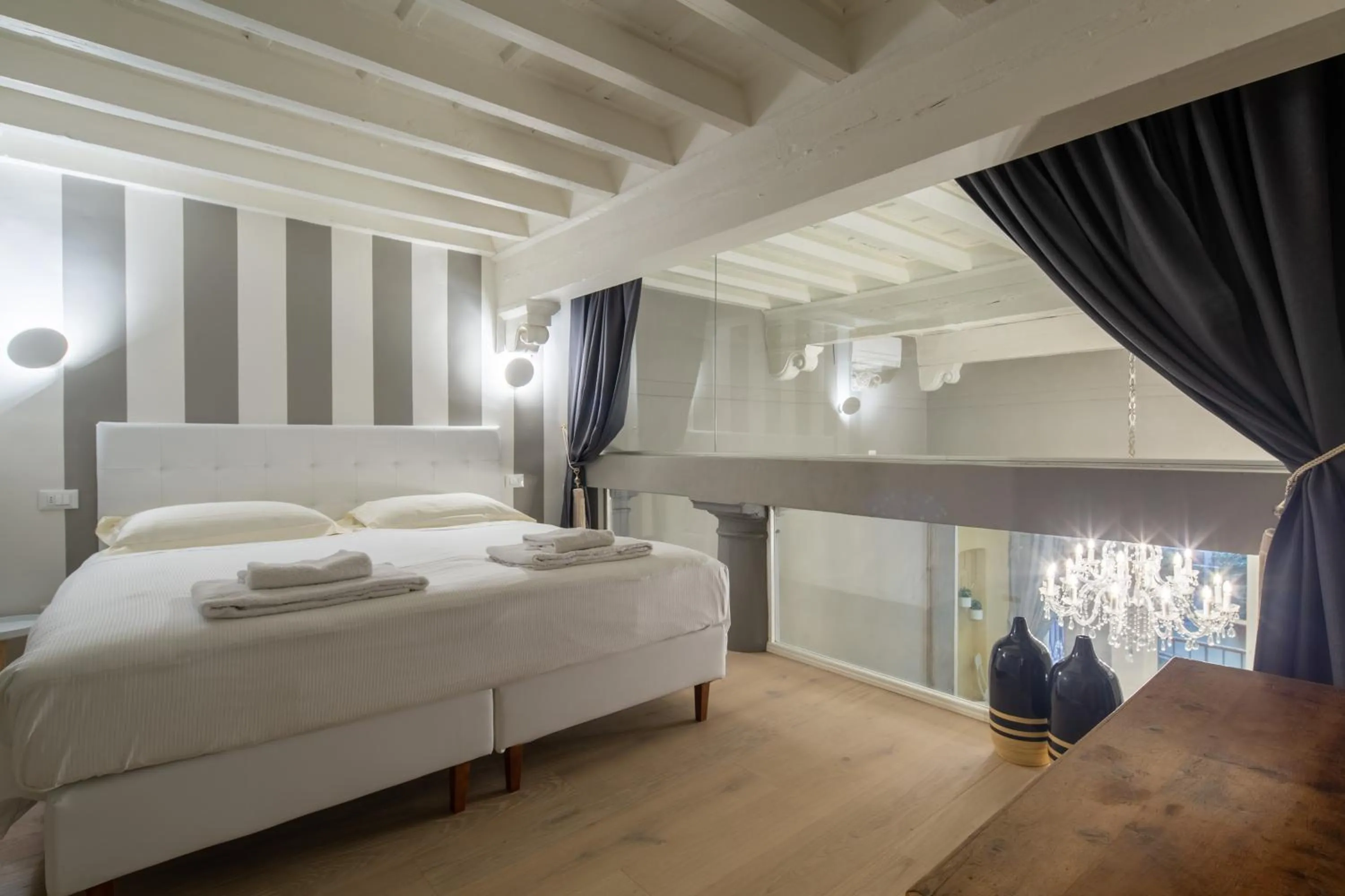 Bed in Casa Velluti Deluxe by Mmega