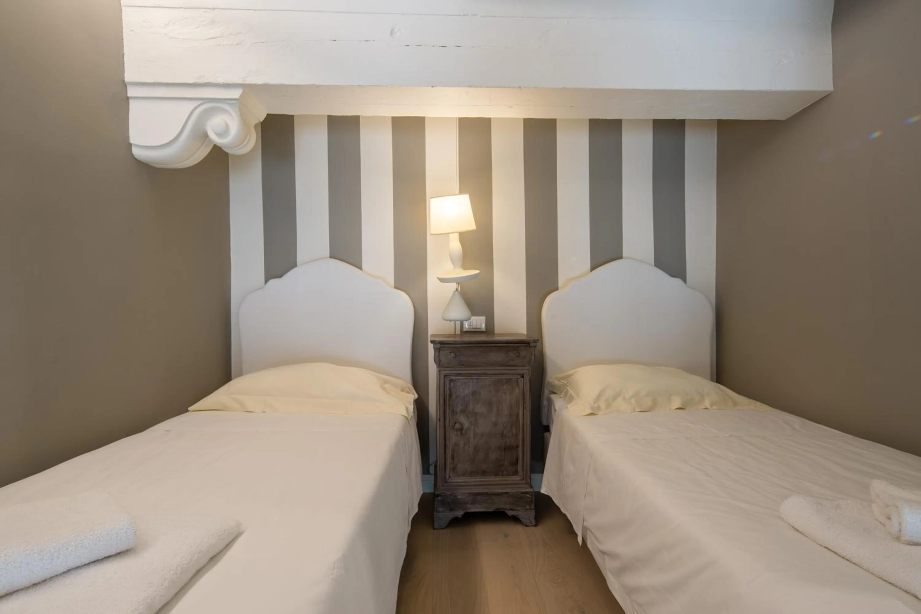 Bed in Casa Velluti Deluxe by Mmega