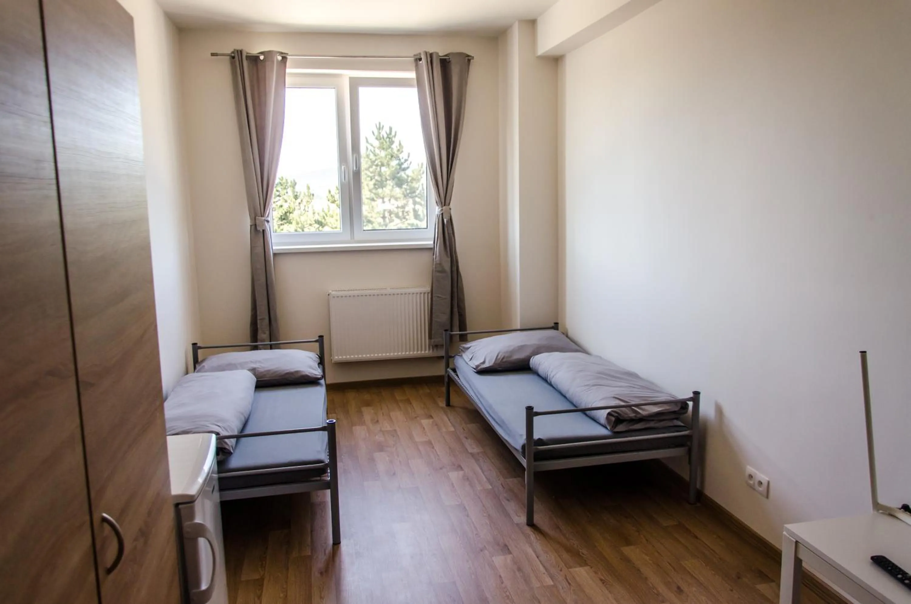 Bed in Ubytovňa Milex