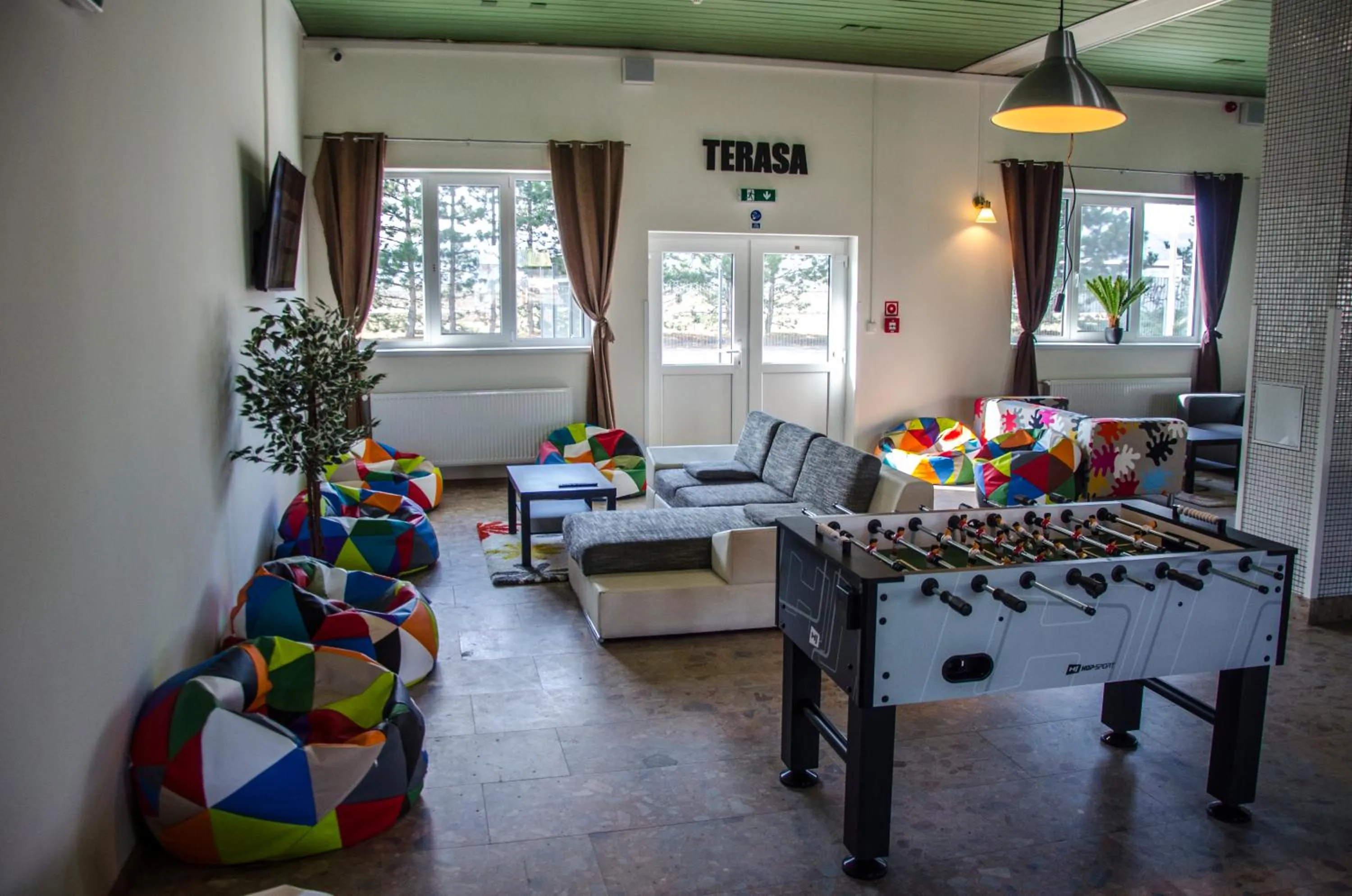 Communal lounge/ TV room in Ubytovňa Milex