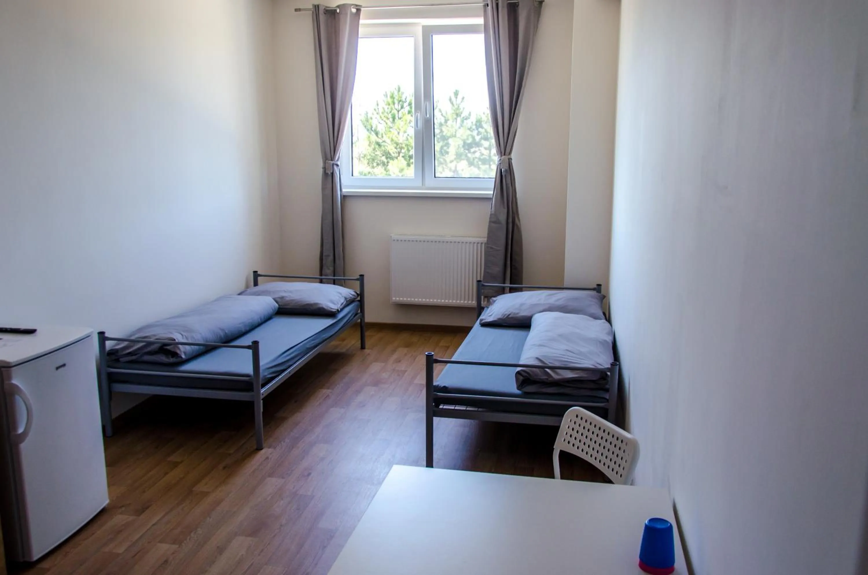 Bed in Ubytovňa Milex