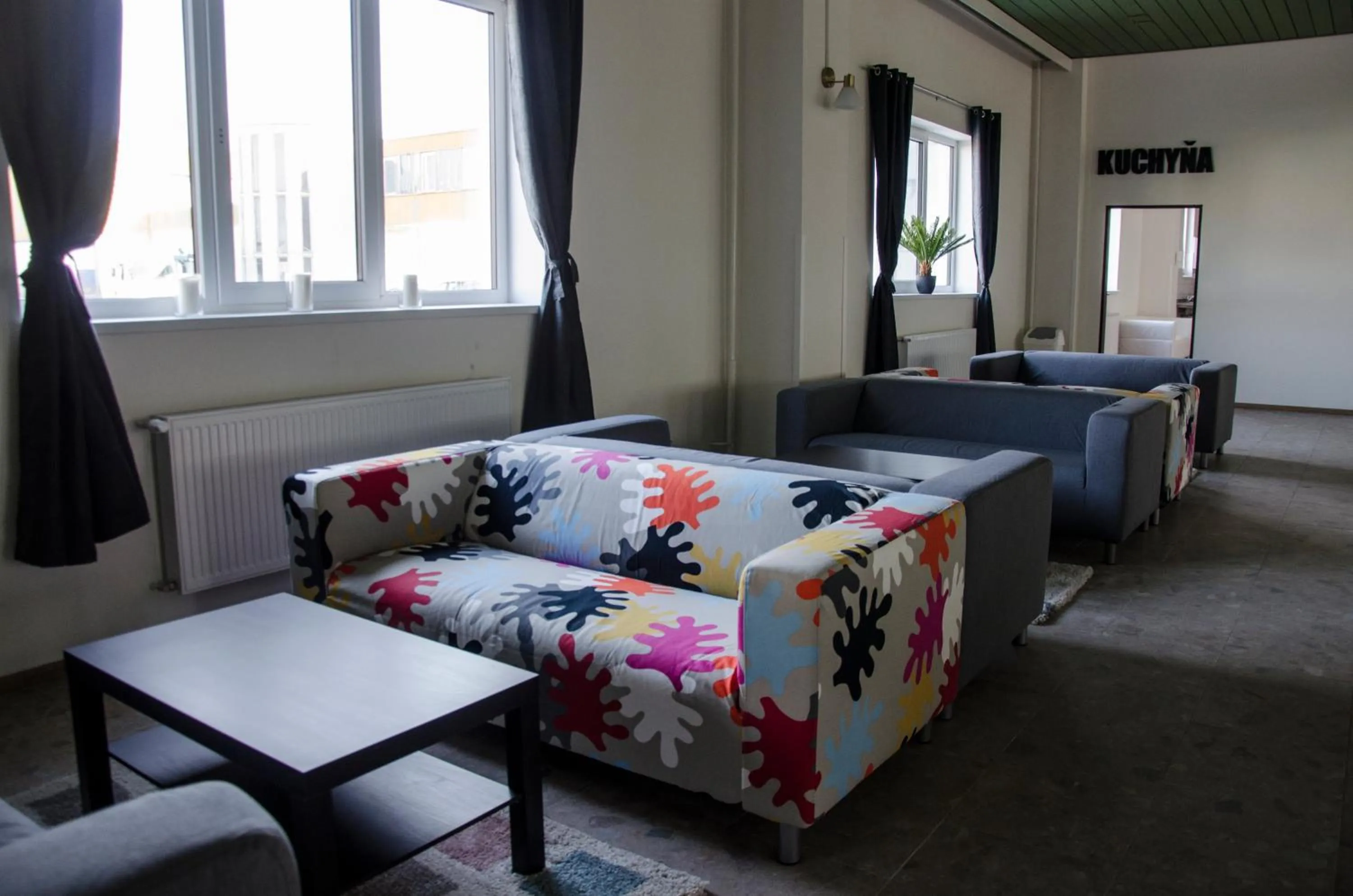 Communal lounge/ TV room, Bed in Ubytovňa Milex