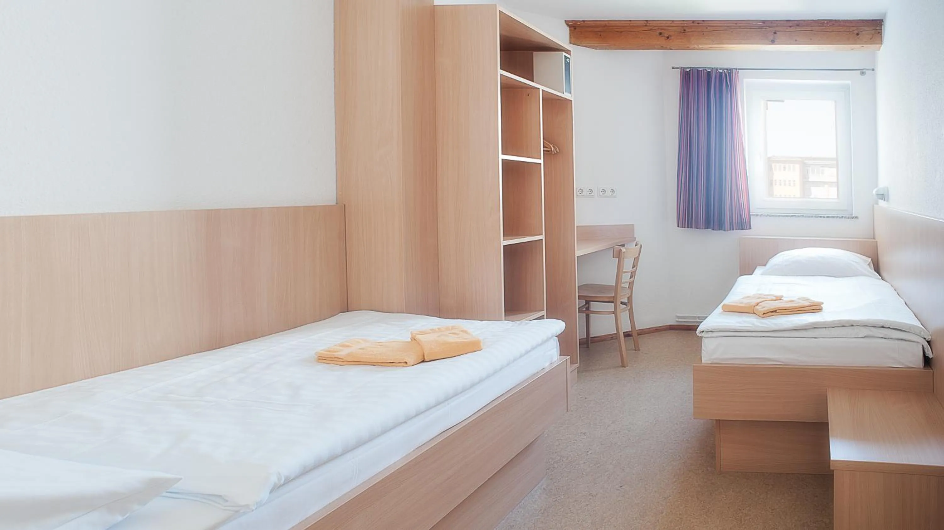 Photo of the whole room, Bed in Steps-Hotel