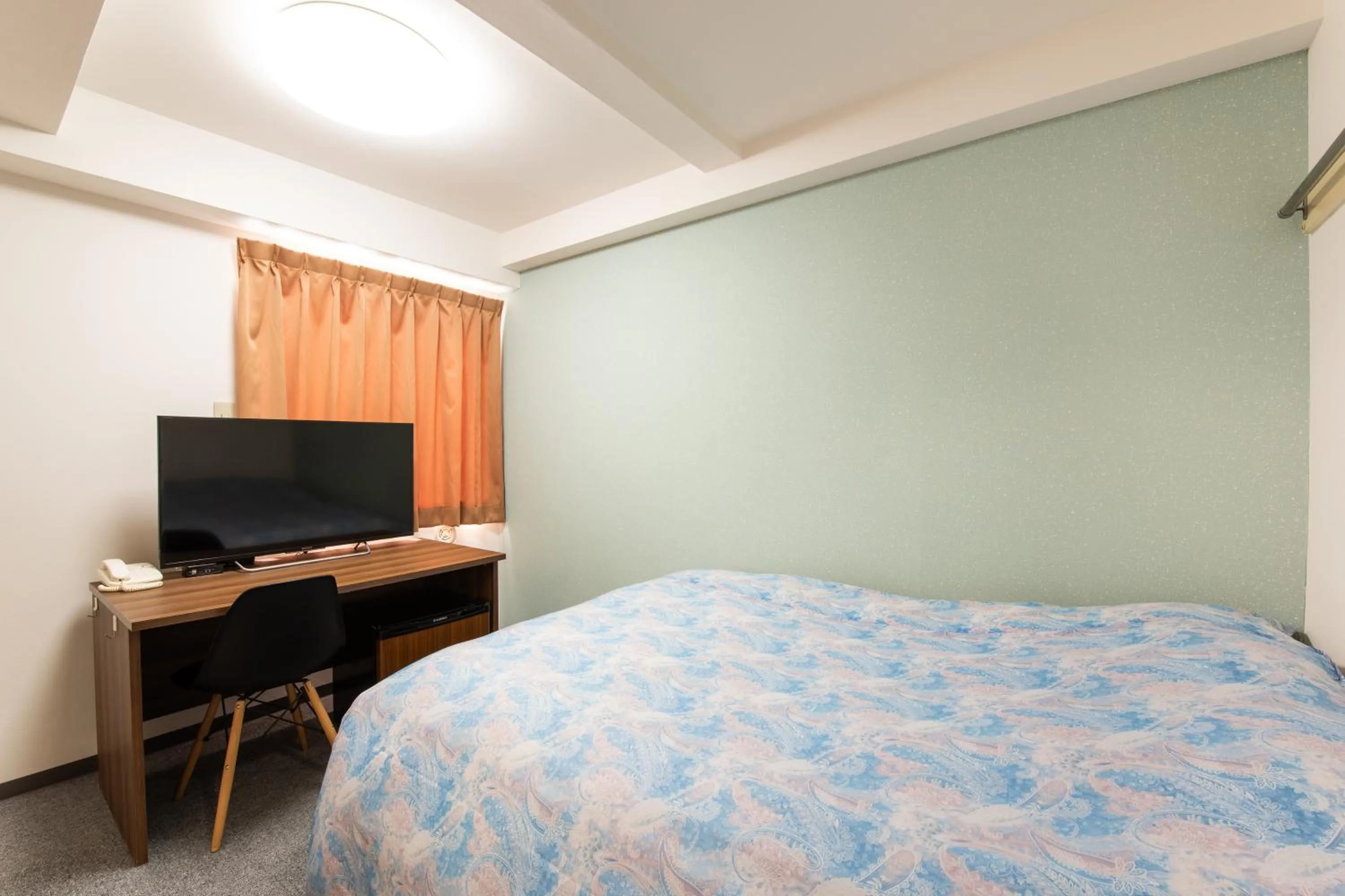 Bed in Yokohama Sakuragicho Town Hotel