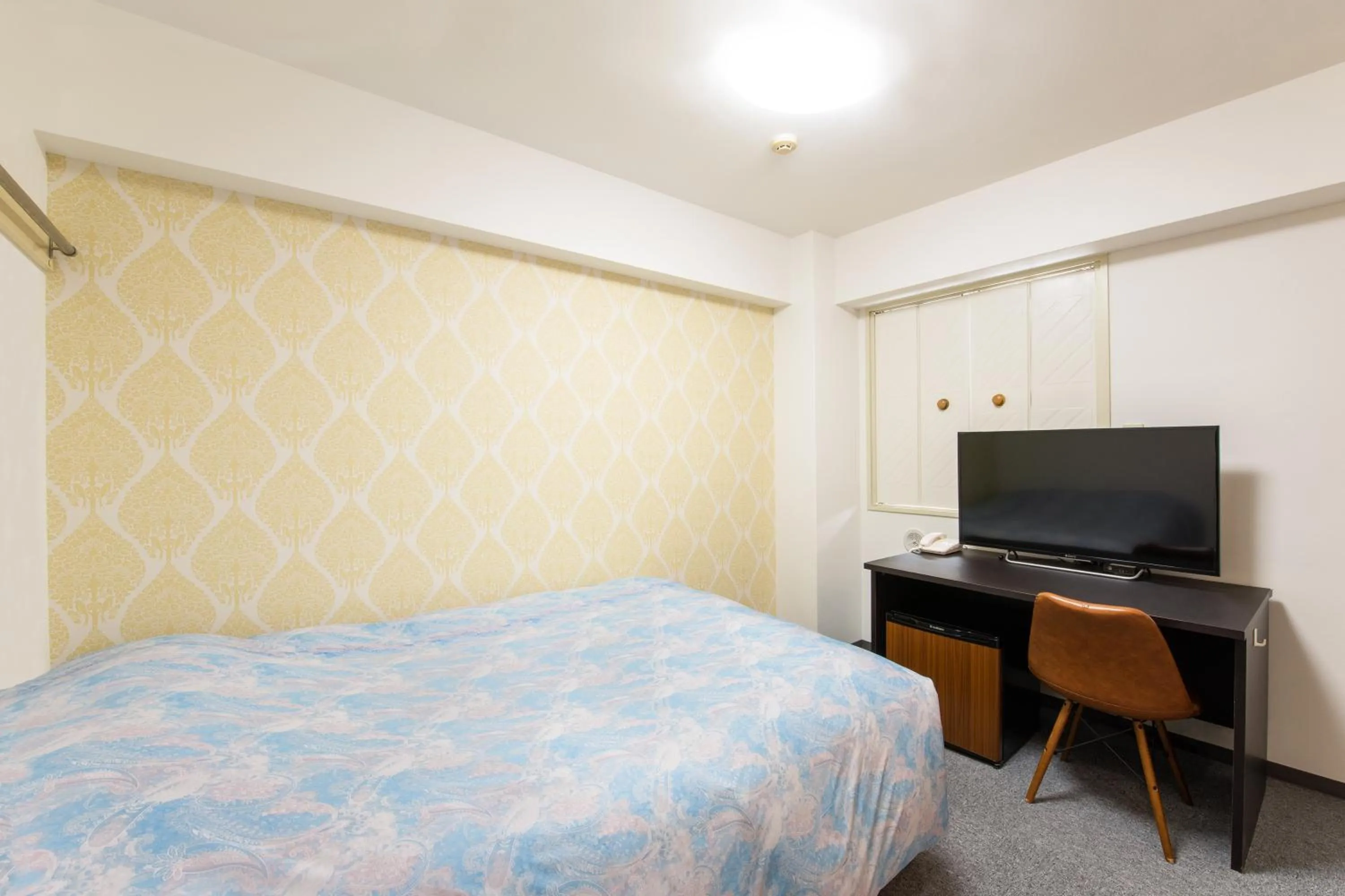 Bed in Yokohama Sakuragicho Town Hotel