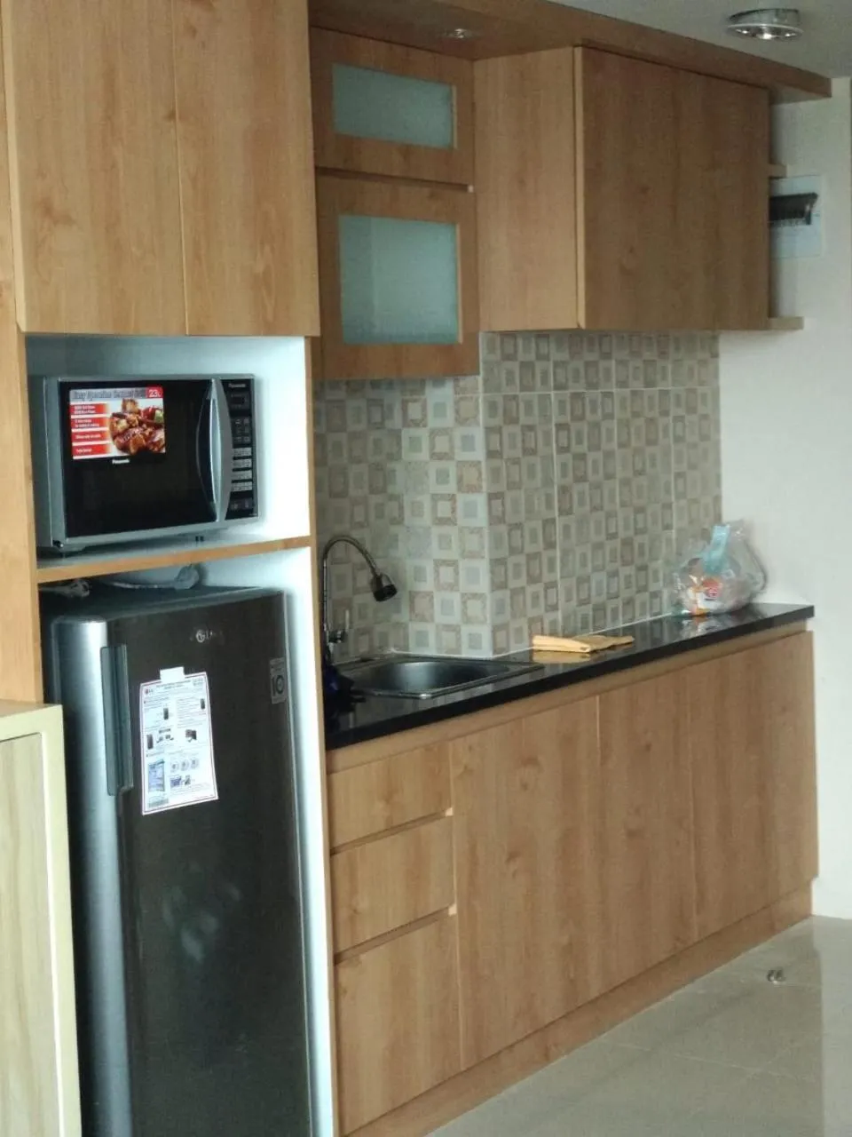 Kitchen or kitchenette in Channel Stay @ Bogor Icon Apartment