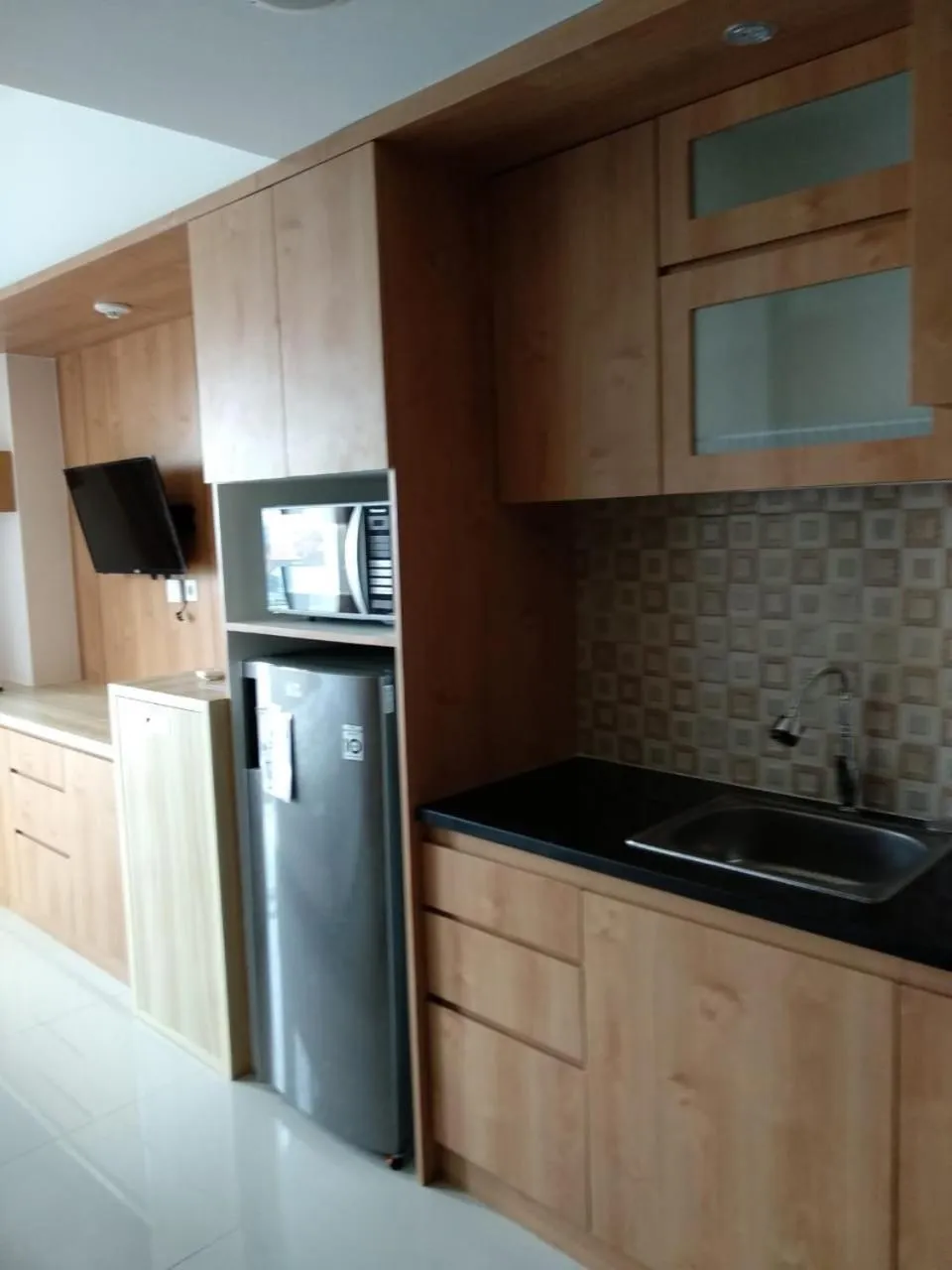 Kitchen or kitchenette in Channel Stay @ Bogor Icon Apartment