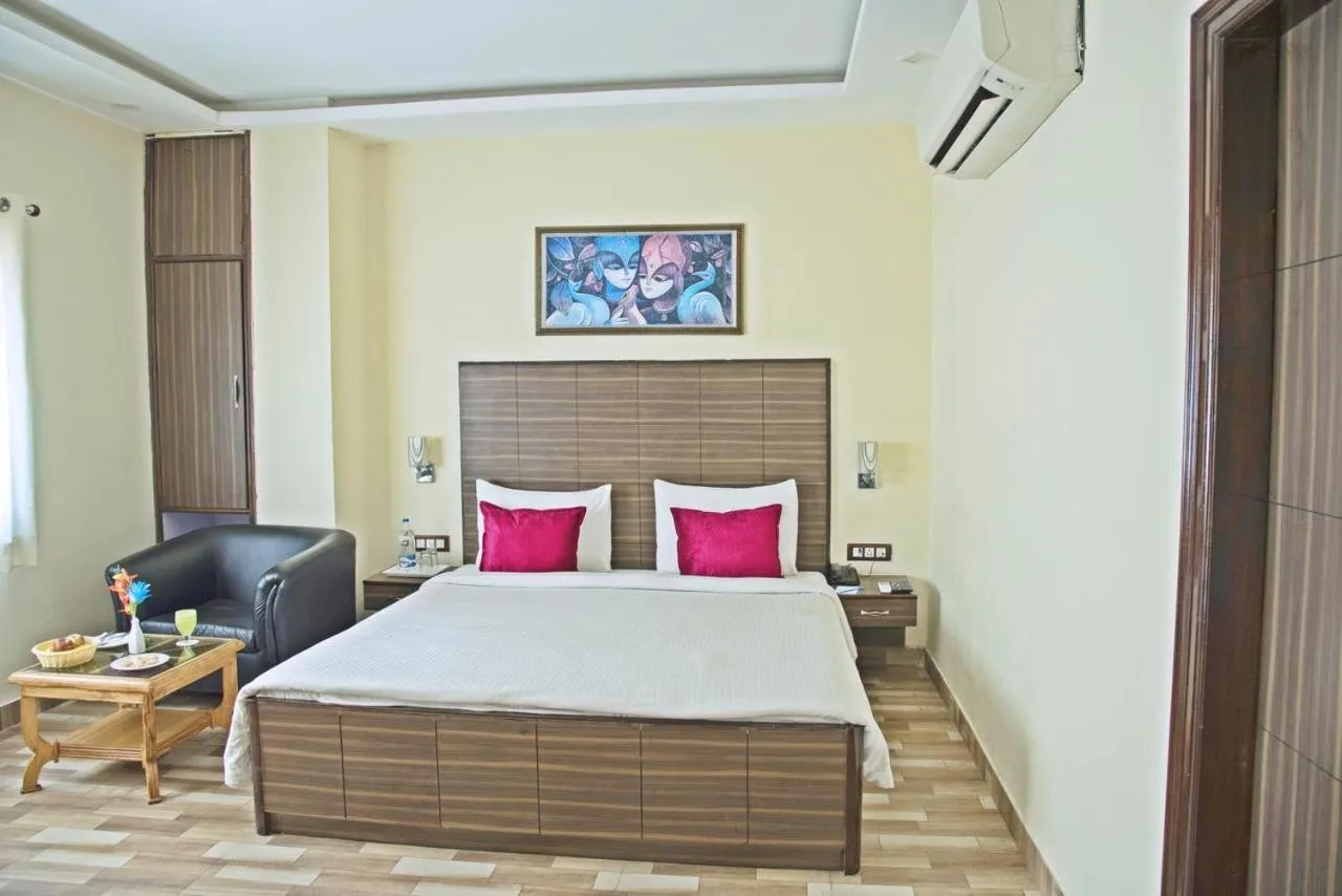 Bed in Spring Sky Mughalsarai By ShriGo Hotels