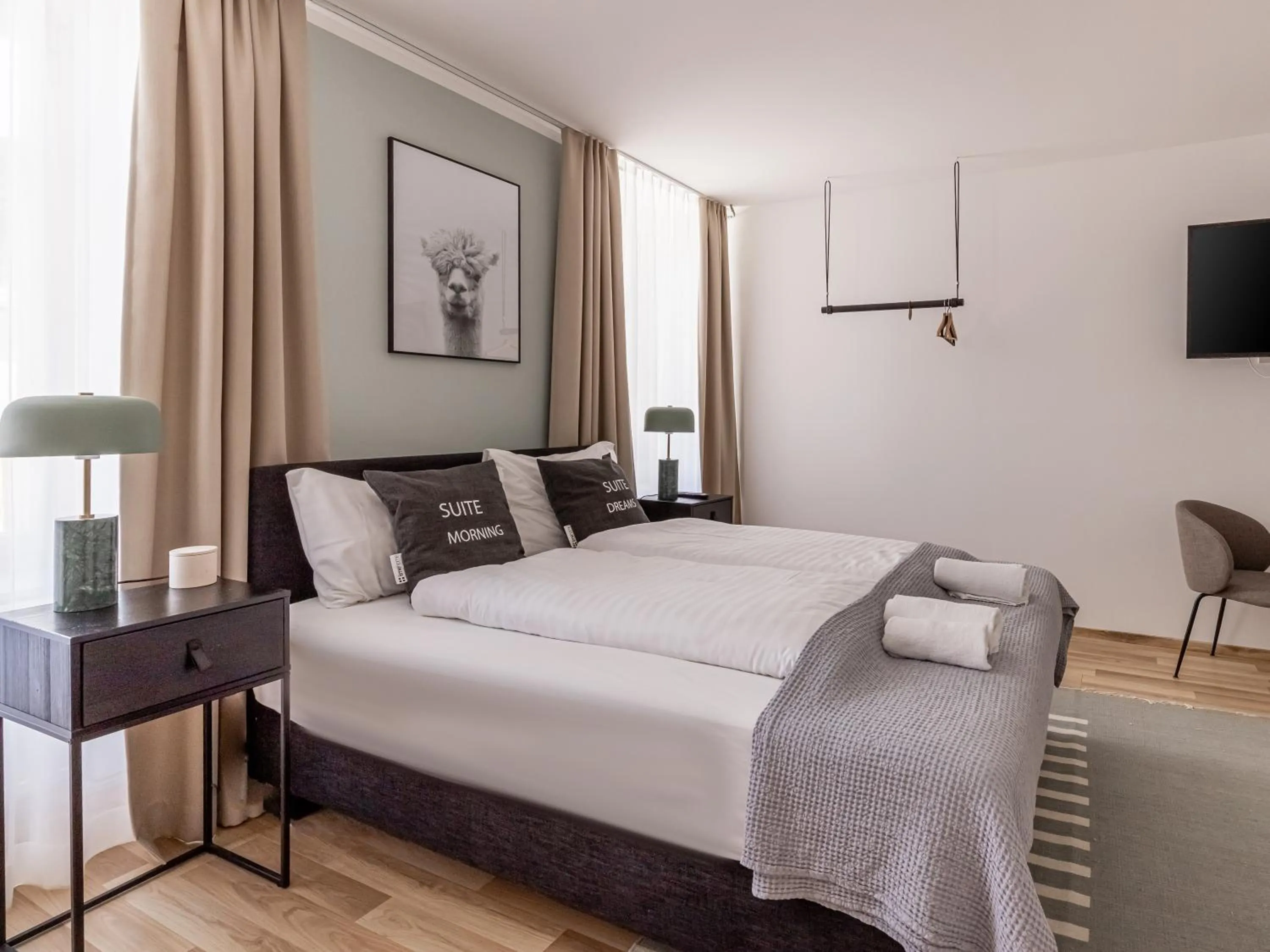 Bed in Limehome Villach Kirchenplatz