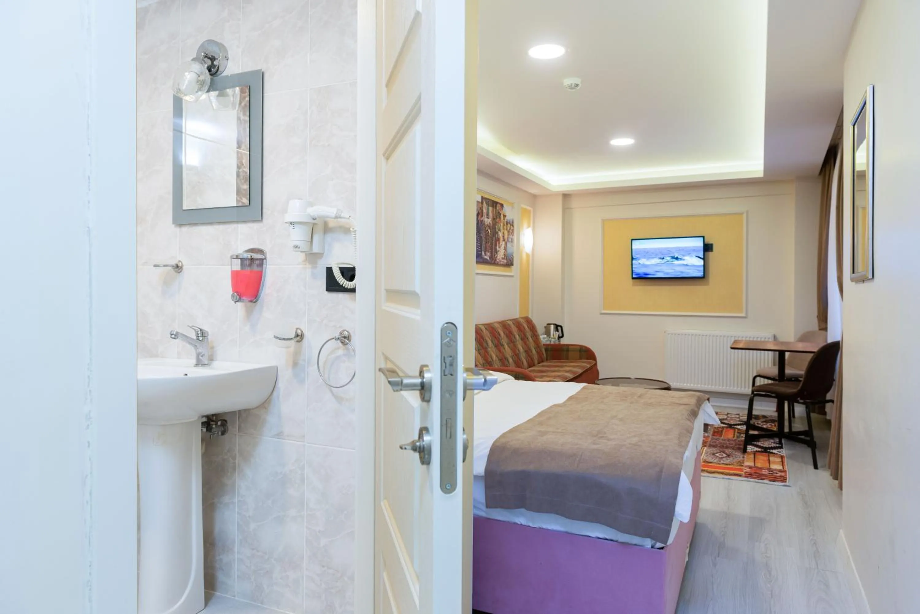 Photo of the whole room, Bed in BLUE MARMARA SUITES