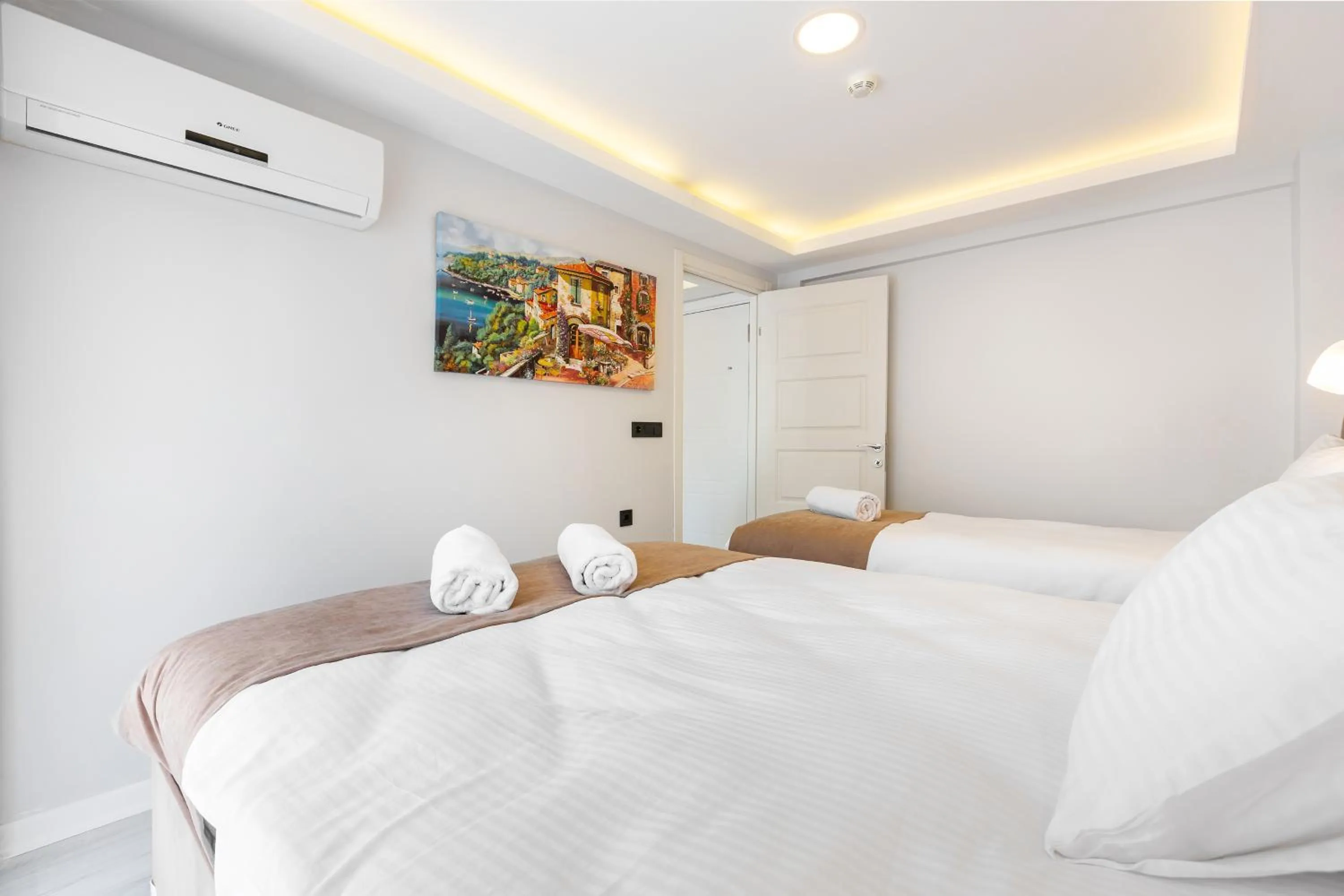 Bed in BLUE MARMARA SUITES