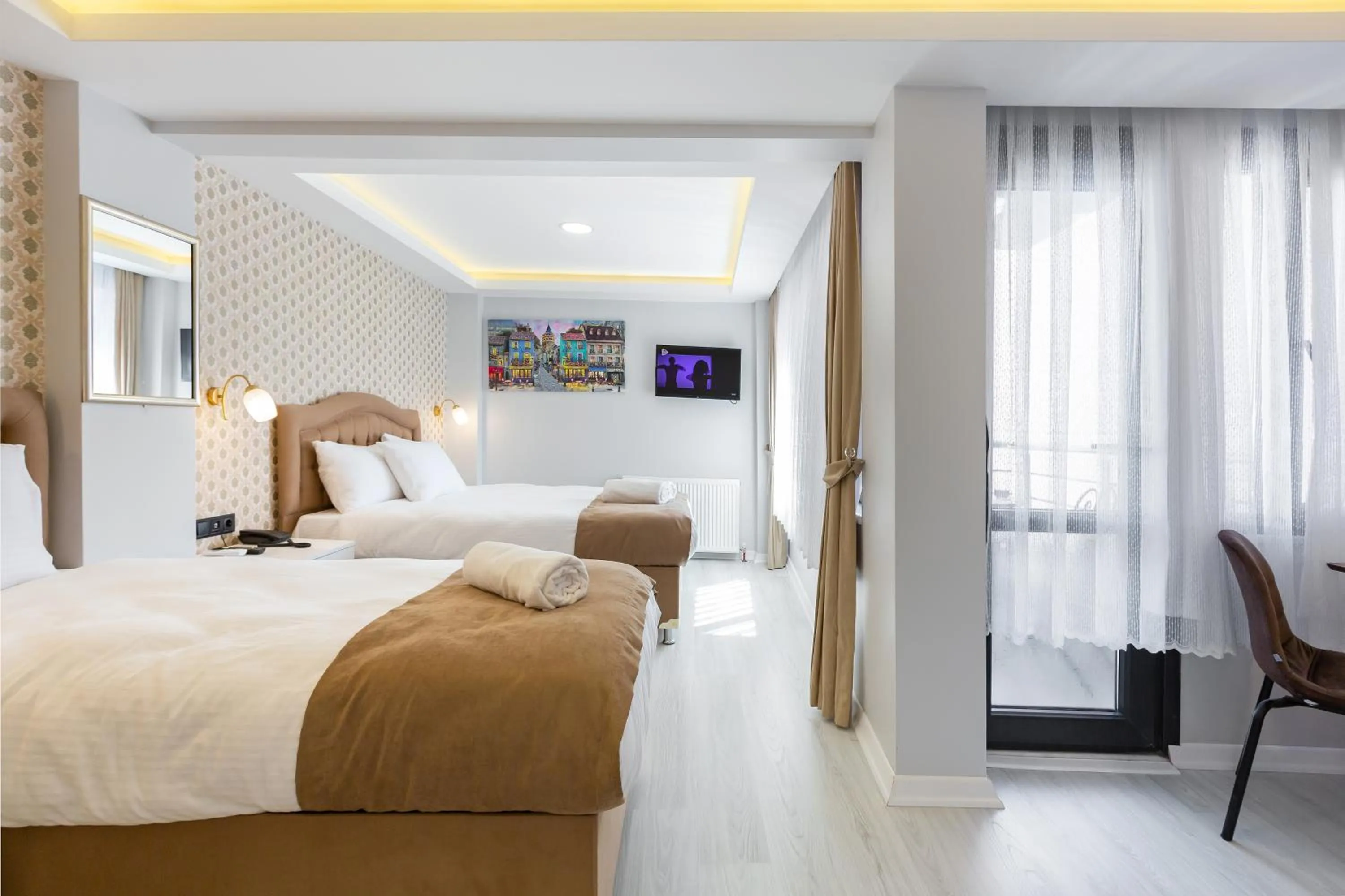 Bed in BLUE MARMARA SUITES