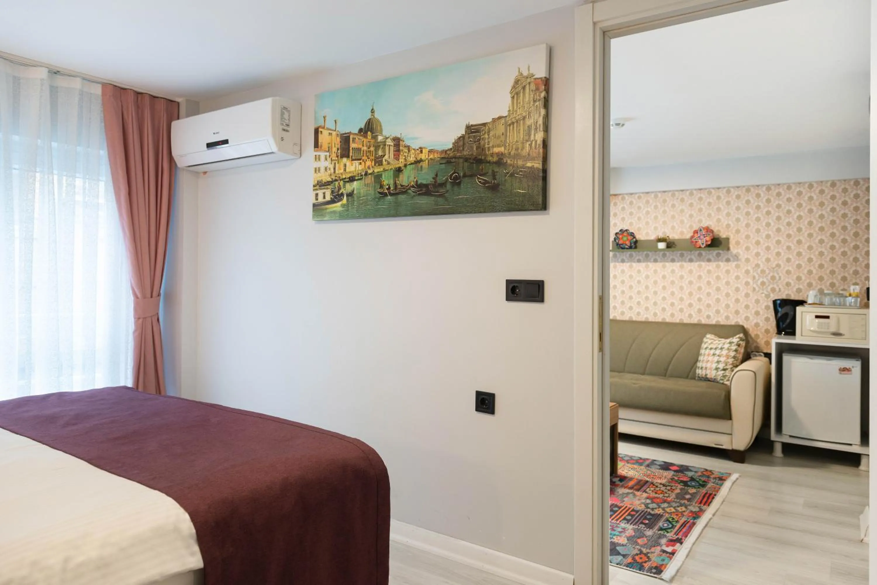 Bed in BLUE MARMARA SUITES