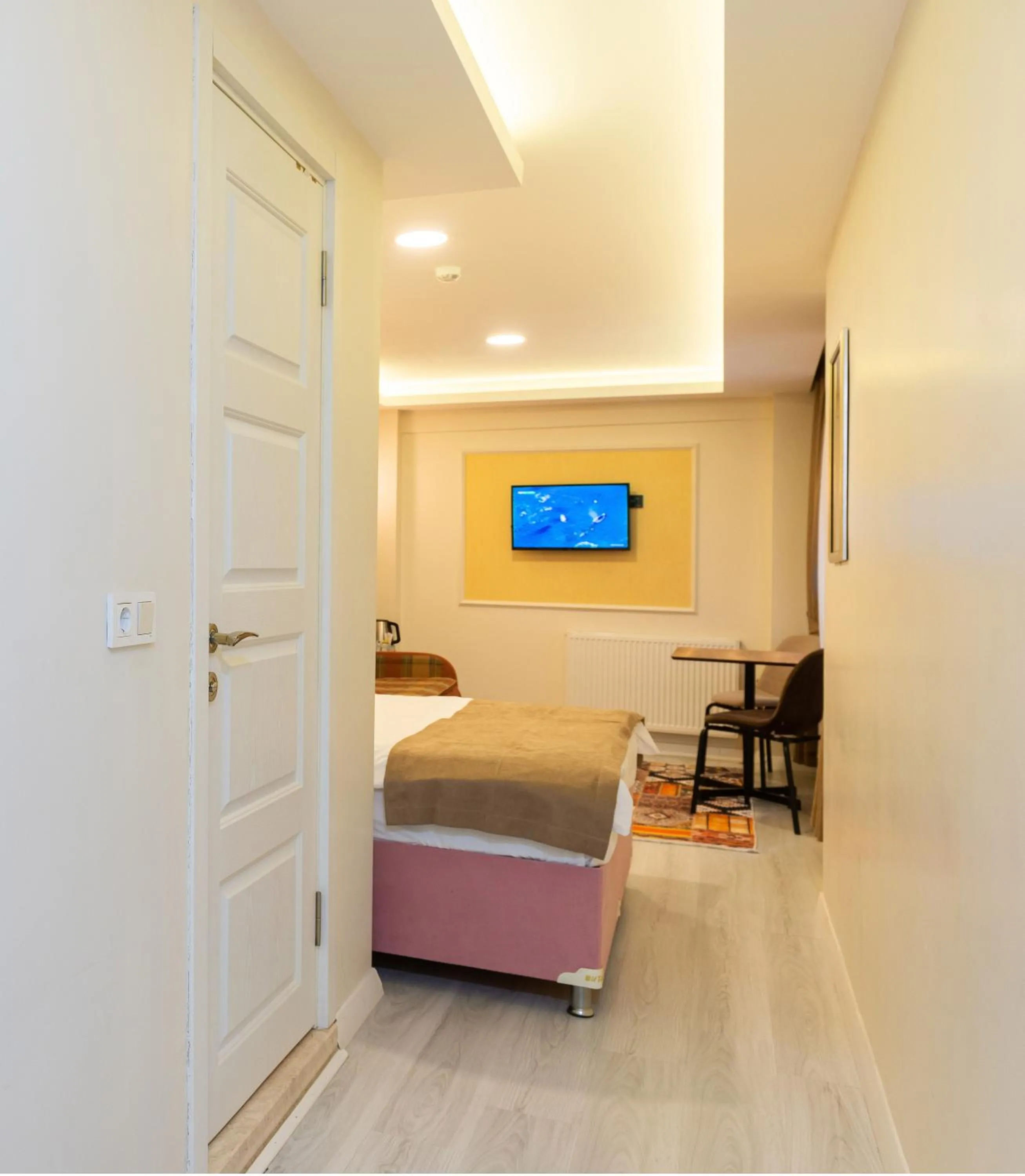 Bed in BLUE MARMARA SUITES