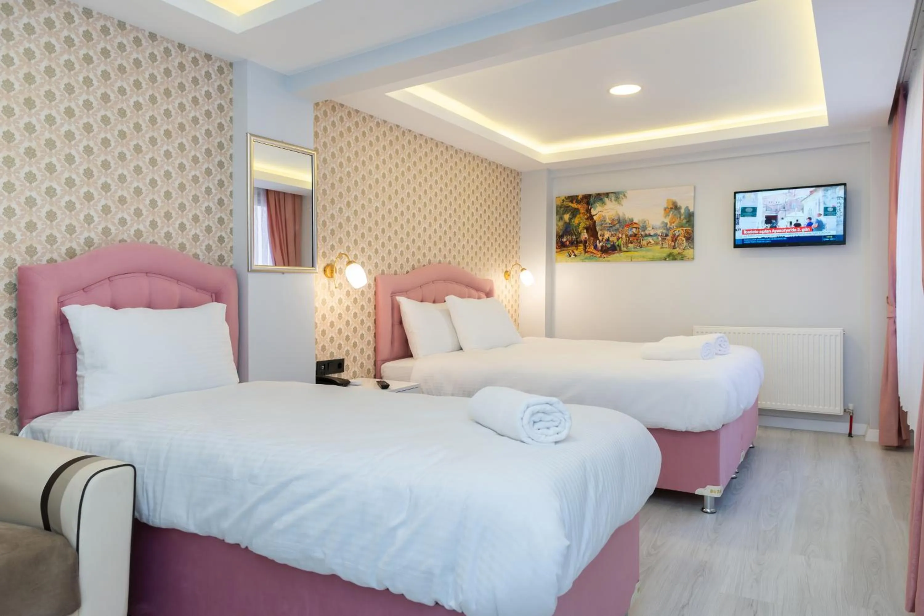 Bed in BLUE MARMARA SUITES