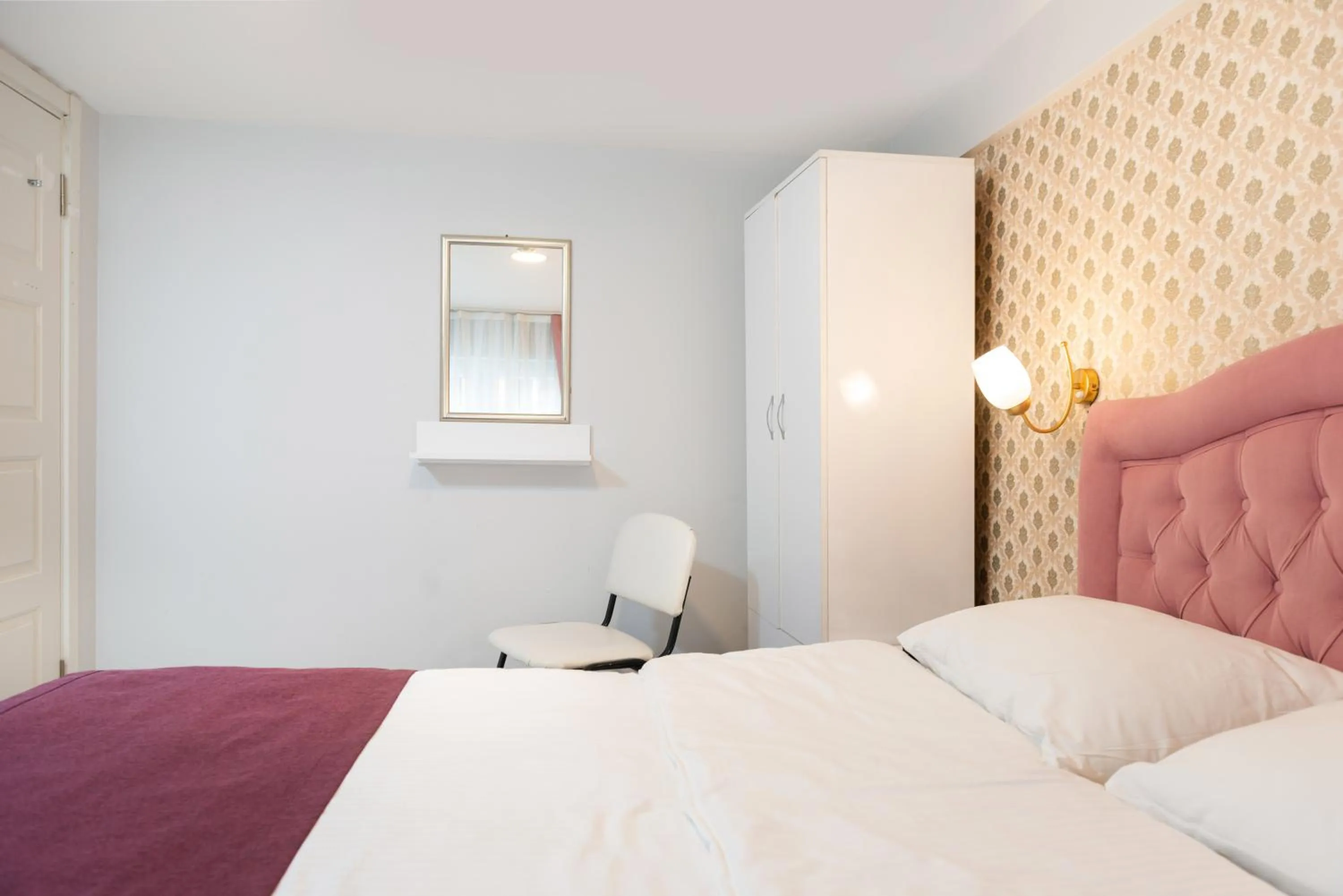 Bed in BLUE MARMARA SUITES