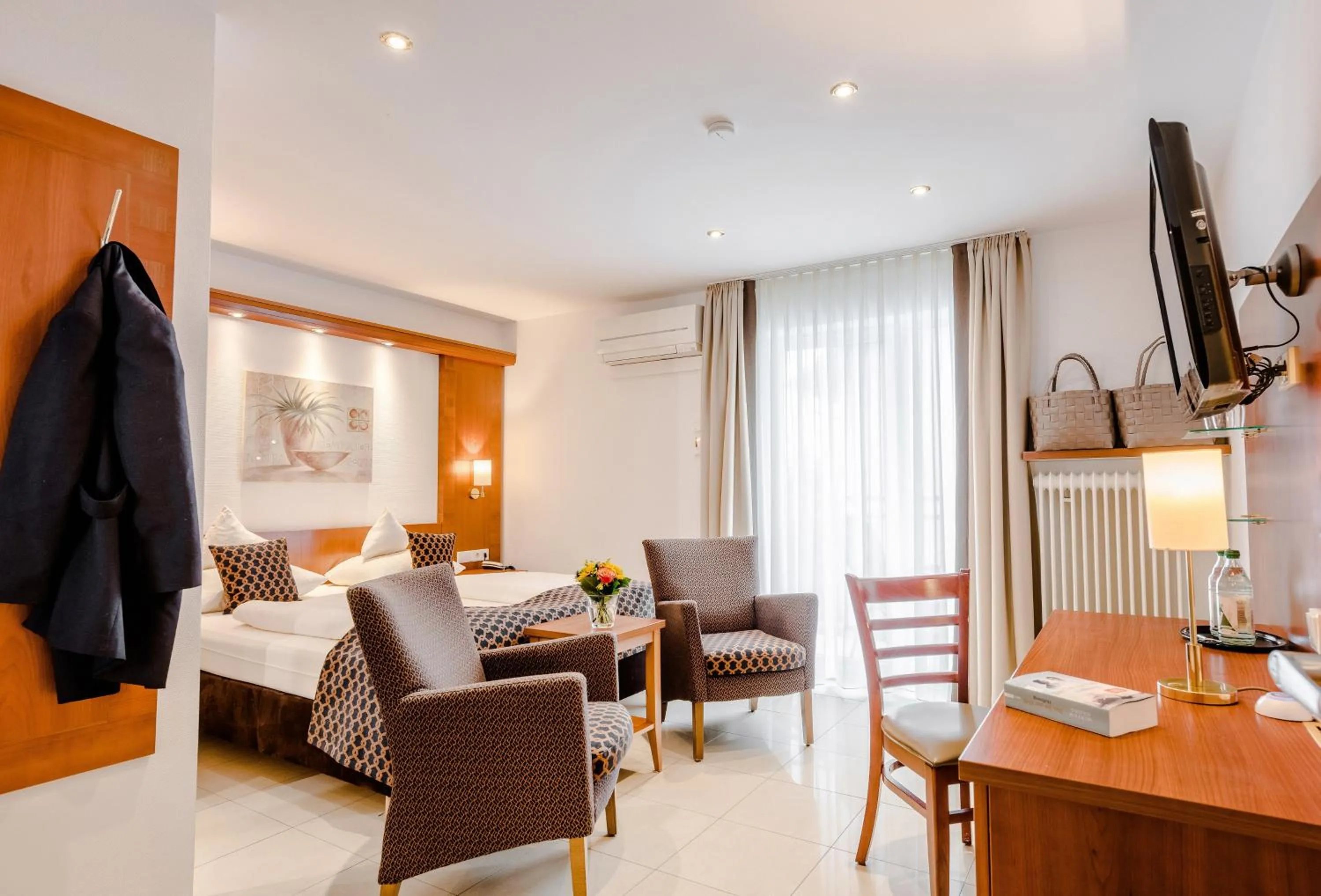 Photo of the whole room, Bed in Wellness- und Gartenhotel Heusser