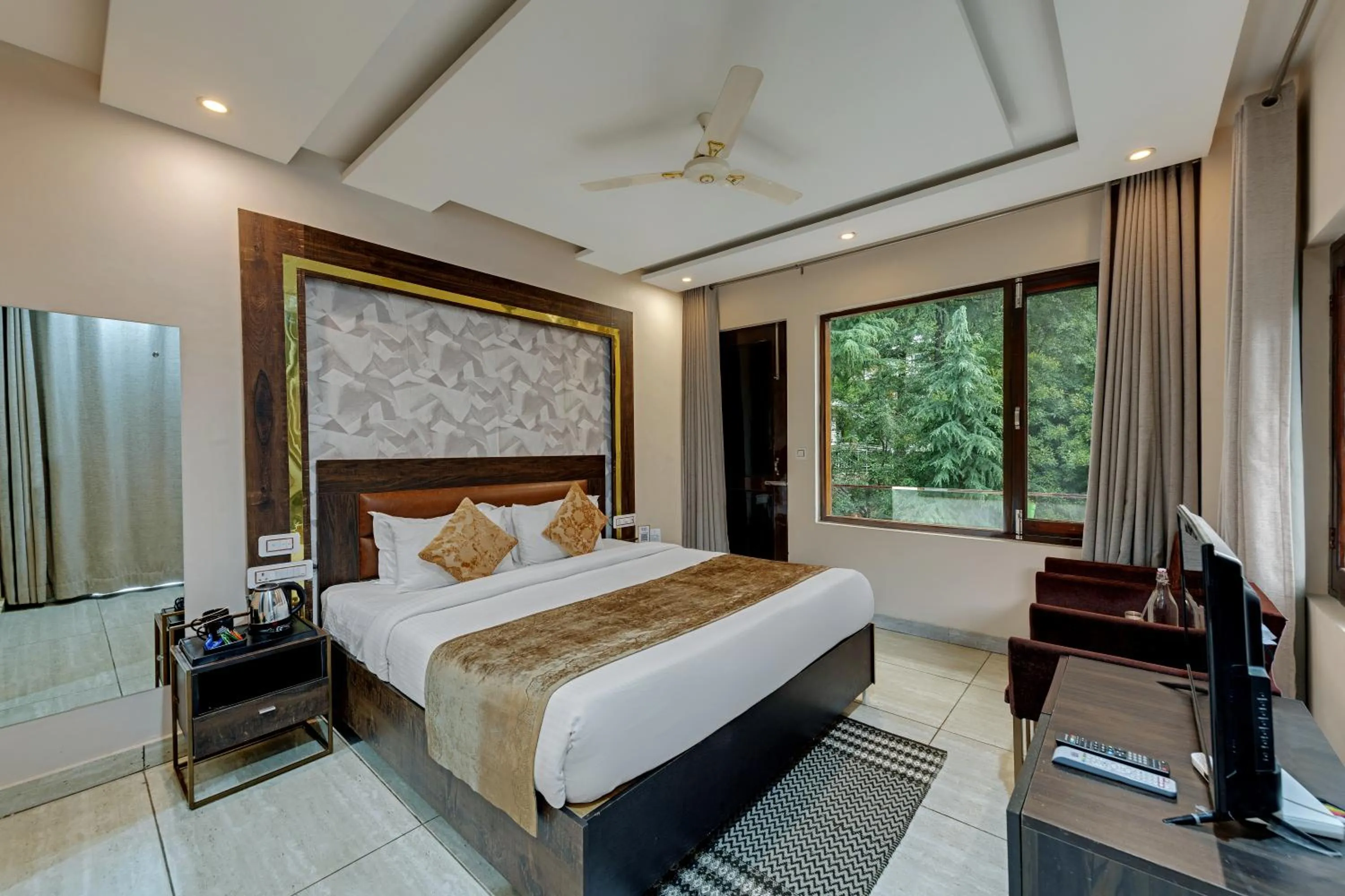 Photo of the whole room, Bed in Golden Rock, Dharamshala - AM Hotel Kollection